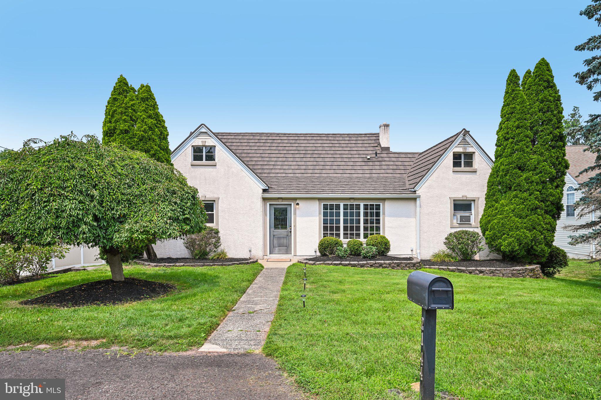 Welcome to this versatile 4-bedroom, 3-full-bathroom home in Lower Pottsgrove, perfectly designed to accommodate multi-generational living or flexible lifestyle needs. The main floor features a spacious living room anchored by a bright bay window, an expansive eat-in kitchen equipped with stainless steel appliances, abundant cabinetry, and generous counter space, along with three main-level bedrooms—including a Primary Suite with an ensuite bath featuring a soothing Jacuzzi tub. Upstairs, the in-law or guest suite offers an ideal private retreat complete with a generous living area, kitchenette, sunroom, fourth bedroom, a full bathroom, plus a large storage closet. Outside, you will find a large, fully enclosed rear yard with a privacy fence, complemented by a broad driveway and an attached garage with an EV charger. Essential upgrades provide ultimate peace of mind, including a waterproofed basement with a French drain, a high-efficiency tankless water heater, smart switches compatible with Alexa or Google throughout, and a long-lasting metal shingle roof featuring a 60-year warranty. Conveniently situated in a desirable school district close to parks, shopping, and all major area amenities, this unique property offers the perfect combination of space, function, and location. Mortgage savings may be available for buyers of this listing.