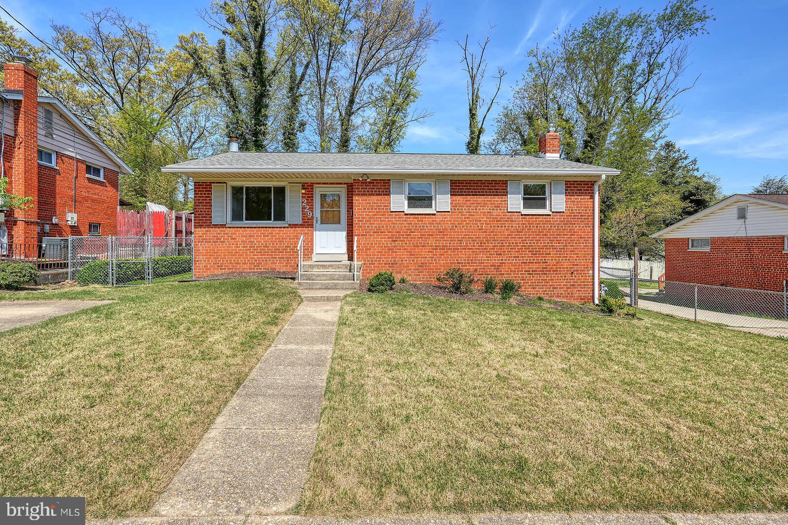 Offer deadline - Wednesday, May 21st, at 10 AM. Discover the potential of 229 Hannes St, a charming brick rambler in Northwood Park View, ready for your personal touch. This solid home boasts timeless appeal with hardwood floors hidden beneath main-level carpeting. The inviting front entrance leads to a bright living room, illuminated by a large picture window. The main level offers three spacious bedrooms and a full bathroom with a tub/shower combo. The kitchen provides convenient access to a deck overlooking a private, fully fenced backyard, complete with a new garden shed, perfect for outdoor relaxation. A practical back entrance connects to the lower level, which features a spacious recreation room with a brick-surround fireplace, a second full bathroom, a versatile bonus room, and a utility/laundry area with an additional rear exit. Recent upgrades include a new roof and gutters (2024), gas furnace (2015), AC condenser unit (2019), hot water heater (2018), and a heavy-up on the main electrical panel (2022). Ideally located, this home is just steps from parks, trails, and Forest Knolls community pool, with easy access to I-495 and Wheaton Metro Station (Red Line) for seamless commuting. Opportunity awaits to make this gem your own!