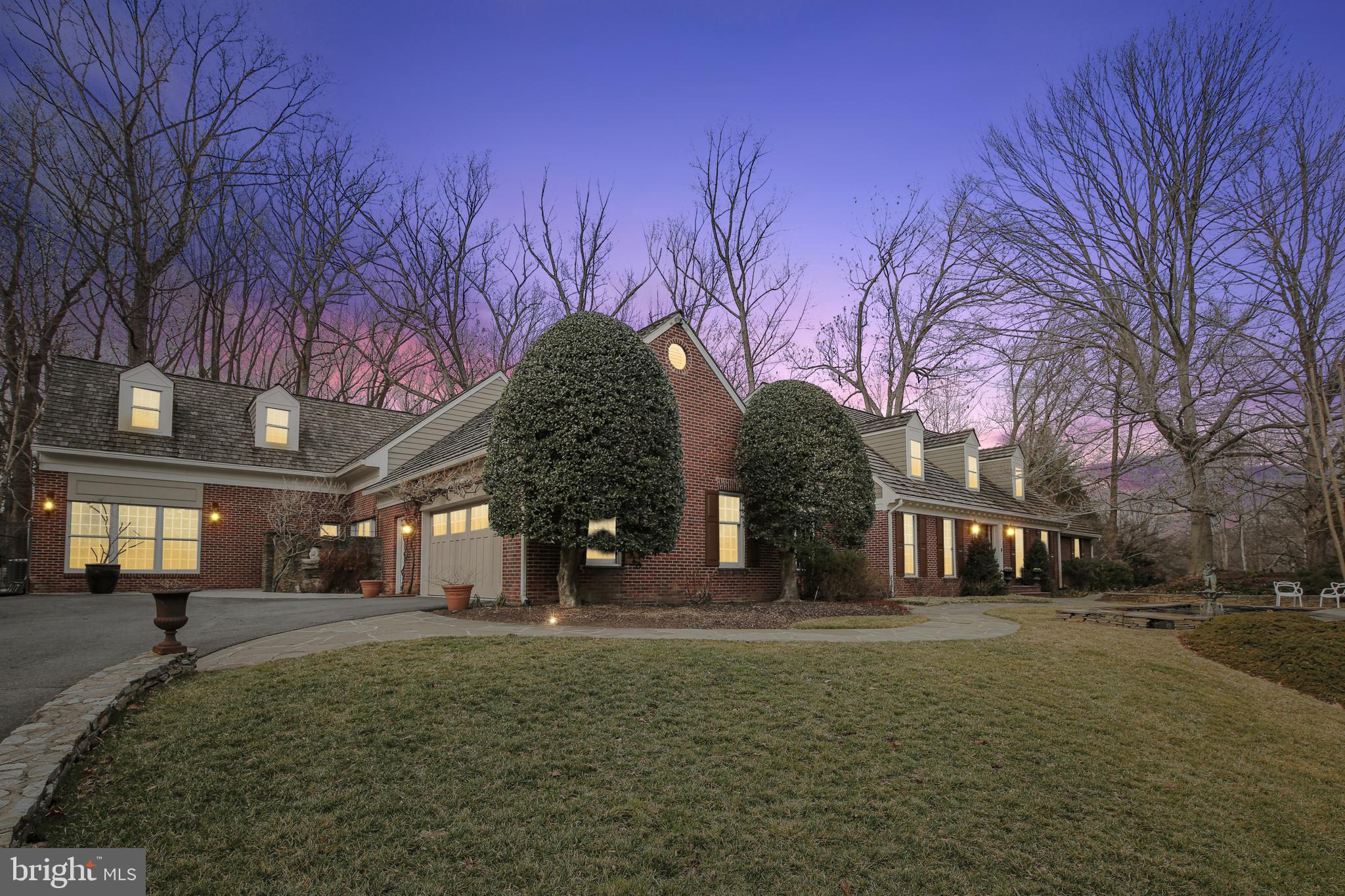 Charming and classic house on a cul de sac in sought after Potomac overlook community of McLean. You will find serenity and privacy in this beautiful home surrounded by scenic landscaping and close to the hiking trails of Scott’s Run Creek.

On an acre and with over 9,500 Sq ft of living space, this Cape Cod is an entertainer’s paradise with ample entertaining areas. Boasting a Large eat in gourmet kitchen with granite, butcher blocks, 9 gas burners, two wall ovens, freezer, serving area and so much more! Enjoyment for years to come gathering in the exquisite dining room with its majestic vaulted ceilings, heated floors and a wood burning fireplace overlooking the enclosed patio to the backyard.

To relax, sit back and enjoy the large fish pond and multiple water fountains or go for a swim in the indoor heated endless pool with heated floors and a full bath. The Master Suite located on the MAIN FLOOR will dazzle you with its oversized built in walk-in closet, spa like bathroom with rain showers, heated floors, towel warmers and large soaking tub. Find Relaxation connecting to nature with 14 ft Vaulted ceilings overlooking an enclosed patio and take the stairs down  to your private office.

Three bedrooms upstairs with 2 full baths( en-suite in the Main Bedroom) . A whole separate addition of an in Law suite with  kitchenette, large entertainment areas,  offices with built-ins, a bedroom and a full bath on the upper level . You will also find an au- pair suite with a full bedroom and bath , a den, a green room, a gym, plenty of storage and a fenced in backyard. Ample parking with a 2 car enclosed garage and an additional gated parking for an oversized car. Mud Room.  Langley School Pyramid. Extraordinary location near Great Falls and, close to major commuting routes, Tysons corner and close to the airports and DC. A must SEE, come make this amazing home YOURS!
