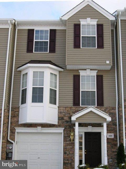 Shows like a new townhome. Move in ready! Nice cabinets and island in Kitchen. Large Master Bedroom with vaulted ceiling, walk-in closet and master bathroom. Huge Living Room with 1/2 bath. Beautiful sunroom in rear. Large unfinished basement which has potential to be a family room, workshop, hobby room, etc. Come and take a look.
