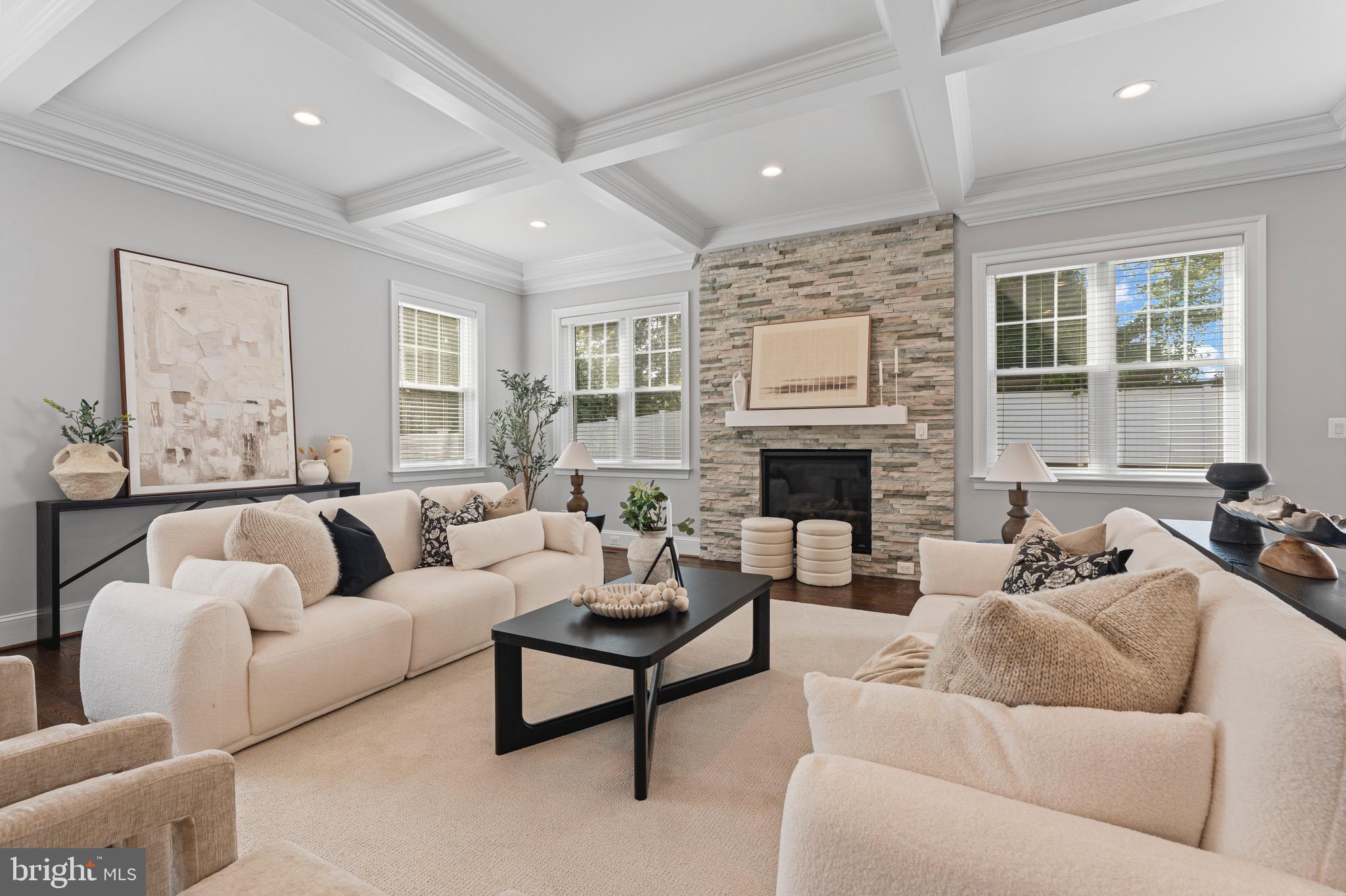 Welcome to 7606 Leonard Drive — five bedrooms, five bathrooms, and over 6,300 square feet of thoughtfully designed living space in the heart of Pimmit Hills, one of Northern Virginia's most connected communities.

Built in 2019, the home opens to soaring ceilings, rich hardwood flooring, and custom millwork that set the tone for the modern Craftsman character carried throughout. The gourmet kitchen anchors the main level — outfitted with professional-grade stainless steel appliances, a six-burner range, an oversized island with bar seating, and expansive quartz countertops built for both weeknight dinners and weekend entertaining.
The living spaces flow naturally from the formal dining area into the family room, where custom built-ins and a fireplace create an easy sense of warmth. Large windows pull in natural light and frame views of the landscaped backyard. The floor plan handles both scale and intimacy well — equally suited to a dinner party of twenty or a quiet evening in.

Upstairs, the primary suite delivers: a spa-like en-suite with soaking tub, dual vanities, and a walk-in shower. Additional bedrooms are generously sized with their own baths, and the fully finished lower level gives you the flexibility to build out a home theater, gym, or recreation space to fit how you actually live.

Outside, a private yard on a 10,000+ square foot lot is ready for alfresco dining, weekend barbecues, or a quiet evening under the stars.

And then there's the location. Pimmit Hills puts you minutes from Tysons Corner's world-class shopping, dining, and employment hub — with two Metro stations close at hand. The West Falls Church station (Orange & Silver Lines) sits less than a mile from the neighborhood's southern edge, and the McLean station (Silver Line) is roughly two miles to the north. Whether you're commuting into D.C. or heading out to Dulles, you have real options.

7606 Leonard Drive is the rare home that doesn't ask you to compromise — on space, on design, or on where you want to be.