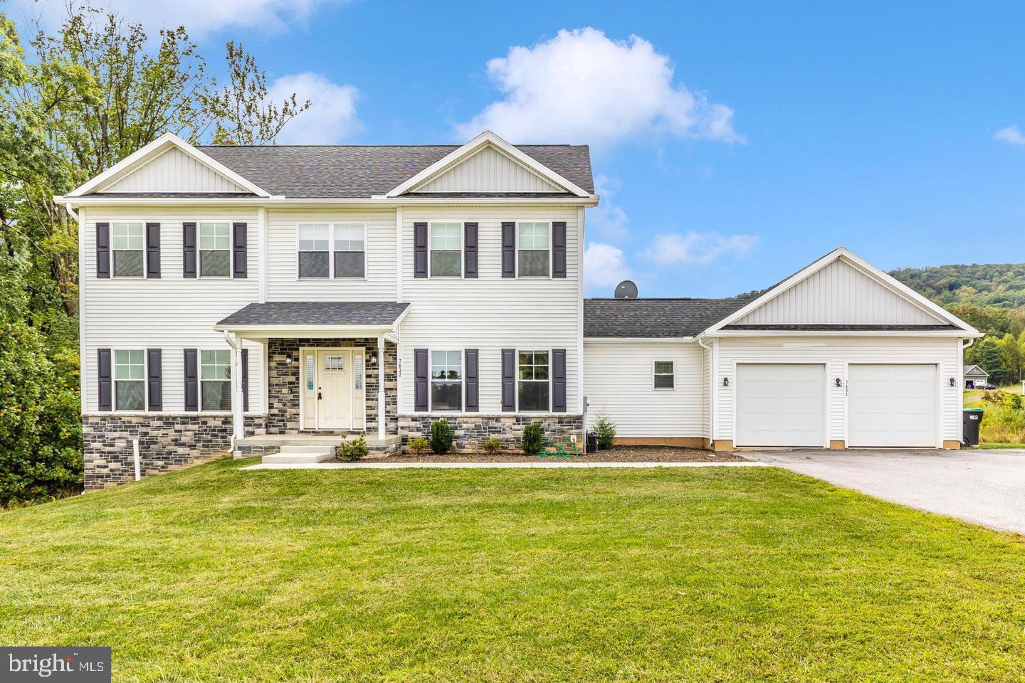 Come and check out this lovely home! Built in 2021 on a sprawling 1.6-acre lot, this home offers  an expansive interior with 4 bedrooms and 3 full baths on the upper level. The main level offers a spacious, open concept living area. There is also a family room with fireplace, complete with custom stone and marble wall, a gourmet kitchen with stainless steel appliances, a separate dining room, an office space with double doors for privacy, a half bath in the mudroom area with laundry facilities that lead to a large 2-car garage. The fully finished walkout basement offers an additional full bath and a recreation area. Experience the perfect blend of style and practicality in this home that is located in the Frederick County mountains. Enjoy beautiful scenic views and have the convenience of close proximity to shopping, dining, and commuter routes. Don’t miss the opportunity to make this exceptional property your own! Come and schedule your showings now!