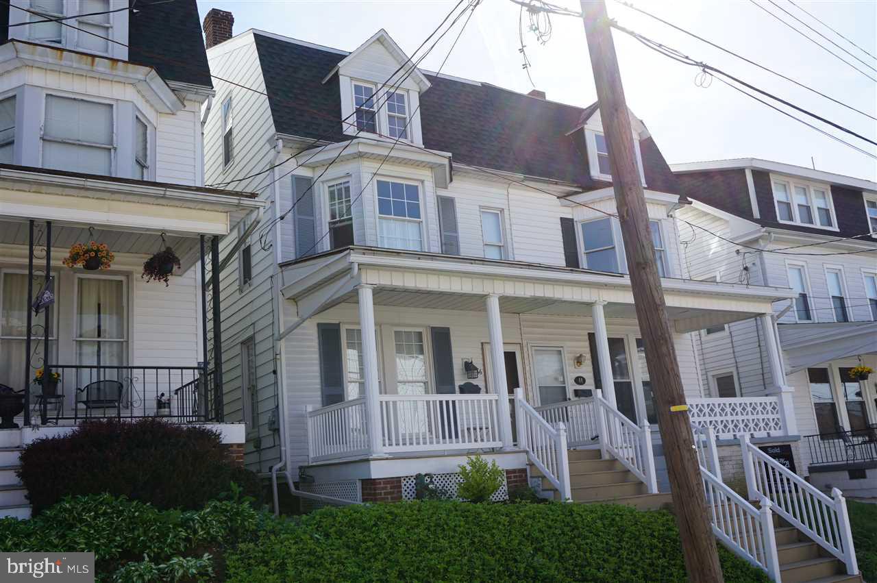 Check out this WINNER! This 4BR 2.5 BA hm has abundant space & has been meticulously updated w/ quality materials & workmanship! New in 2014: roof, Energy-Efficient furnace, CAC & HWH, updated KIT, SS appliances, new baths, all new flr coverings, majority of replacement windows, electricity rewired, 1st flr LAU. There's a nice back yard, brick patio, GAR & porch!