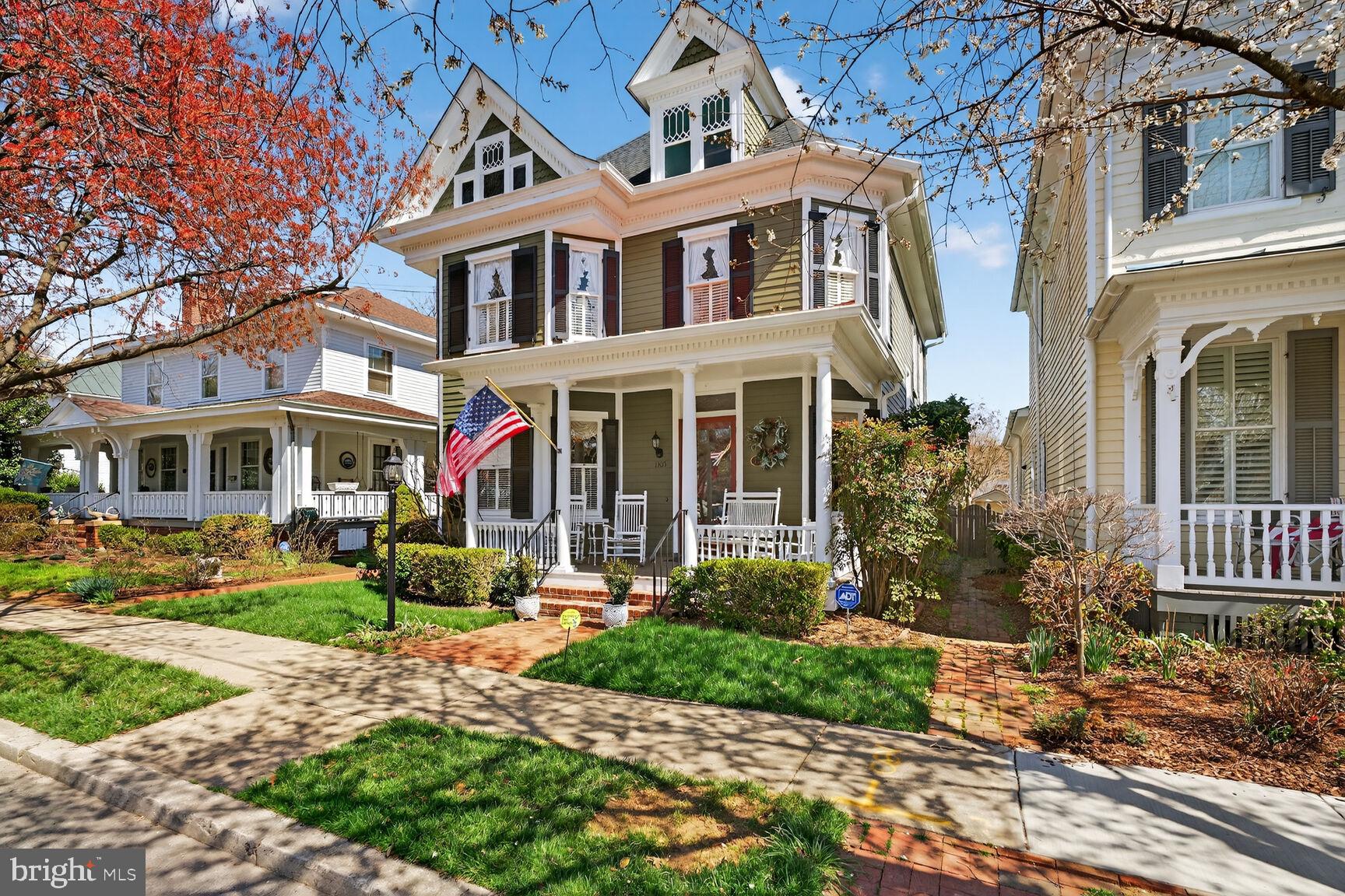 THE PROPERTY FOR THOSE WHO LIKE THE BEST -- Located on THE premier street in Historic Downtown Fredericksburg. .    1305 Washington Avenue is midway between the "Kenmore" Mansion built by Patriot Colonel Fielding and his wife, Betty Lewis Washington (sister of President George Washington) and the Monument to the President's Mother, Mary Washington.   Right outside the front door is the Monument celebrating General  Hugh Mercer, Hero in the American Revolution's Battle of Princeton.
Built by one of Fredericksburg's best contractors, "Peck" Heflin,  this lovely residence is indeed a monument of its own with all the amenities we love from the Victorian era -- Welcoming Front Porch, Sparkling Hardwood Floors, 10-foot Ceilings, Pocket Doors, Bay Windows, Exquisite Woodwork, Second Staircase, Transoms, and Four Fireplaces.  Updated seamlessly and thoughtfully.   For example. the custom kitchen with sage green cabinetry  softens the room and makes it fit in with the rest of house. Note:  The two main floors have 2,554 square feet of living space.  Additionally, there are walk-up  attic spaces and lower level spaces.  The gross square footage is 4,979.  Make it yours today!