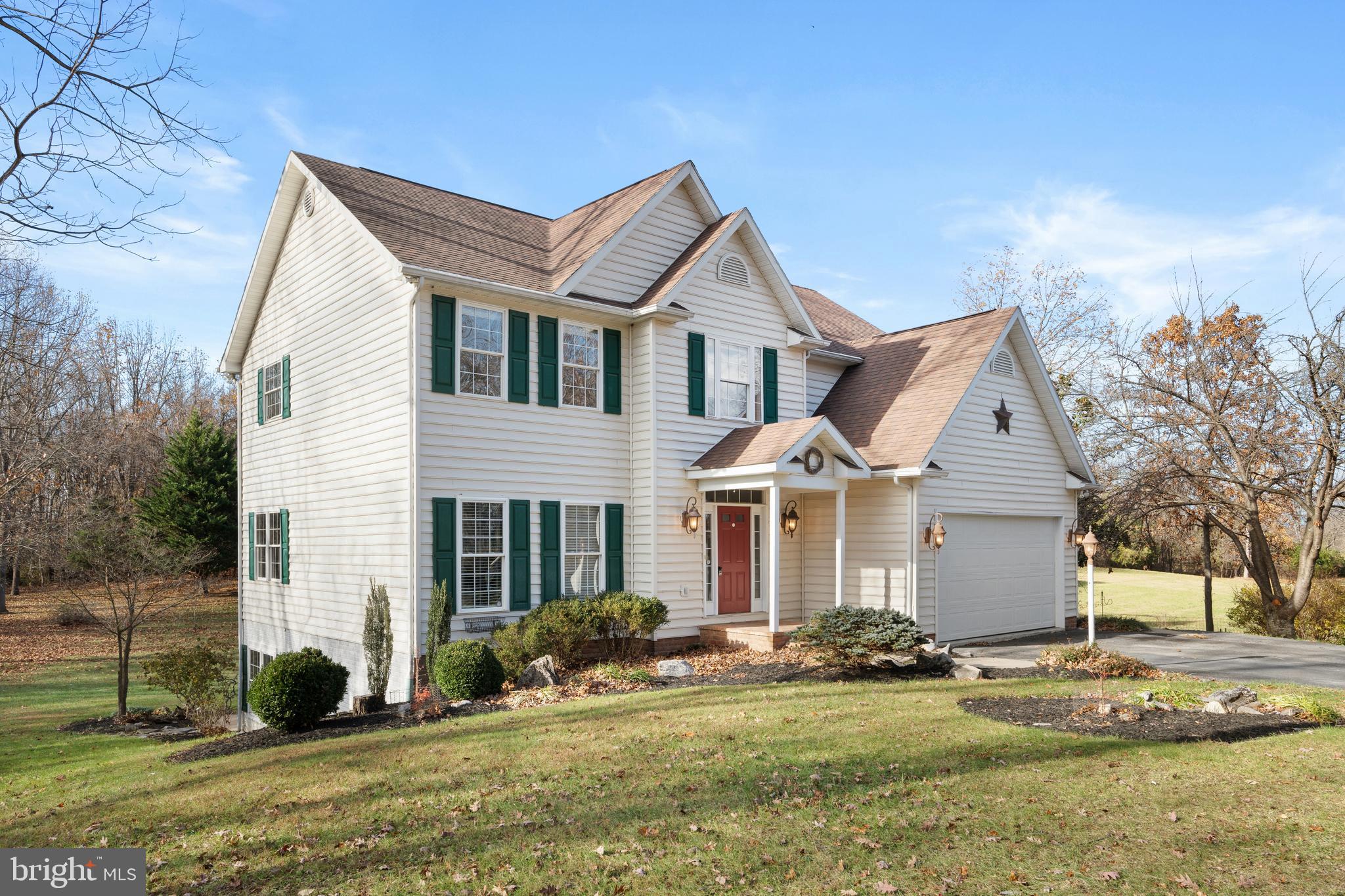 Stunning 3-Bedroom Colonial on a Private 3-Acre Lot Welcome to this beautiful 3-bedroom, 2.5-bath colonial set back off the road for complete privacy. The home features a spacious two-story family room with a wood-burning fireplace, perfect for relaxing or entertaining. The large eat-in kitchen offers an island, stainless steel appliances, and two pantries for ample storage. The main level also includes a formal living room, formal dining room, and convenient laundry area. Upstairs, you’ll find three generous bedrooms, including a luxurious primary suite with a walk-in closet, soaking tub, and separate walk-in shower. A versatile upstairs family room overlooks the main level, providing additional living or office space. The full basement features 9-foot ceilings, a rough-in for a bathroom, and a tub already installed—ready for your finishing touches. Walk out to the backyard and enjoy your own private park, complete with manicured flower beds and a variety of rare trees. 2 car garage and space for an additional 4 cars in the driveway.