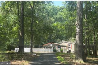 Opportunity awaits on this 5.54-acre parcel with possible potential for subdivision into multiple building lots, subject to all applicable approvals and regulations. The existing residence sustained significant damage and is being offered as a tear-down.

Access to the property is restricted. All agents and prospective purchasers must sign a Hold Harmless Agreement prior to entering the property or accessing the interior of the home. Interior showings will be permitted only after the required Hold Harmless Agreement and Brokerage Waiver has been fully executed and returned to the Sellers Agent.