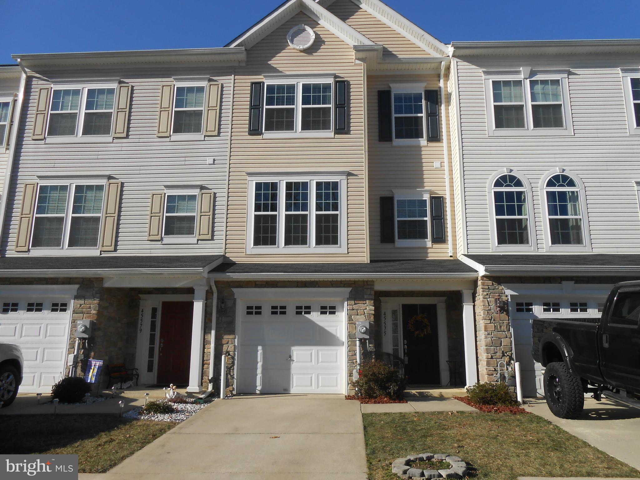 Beautiful 3 fully finished level townhome in Beverly hills. Hardwood floors on main level. Kitchen has a super pantry with island and office area. Fully finished basement, 1 car garage and a fenced backyard to die for!! Separate family room and living room. Lots of room here. Very well taken care of.  24 hour notice if possible because of a pet.