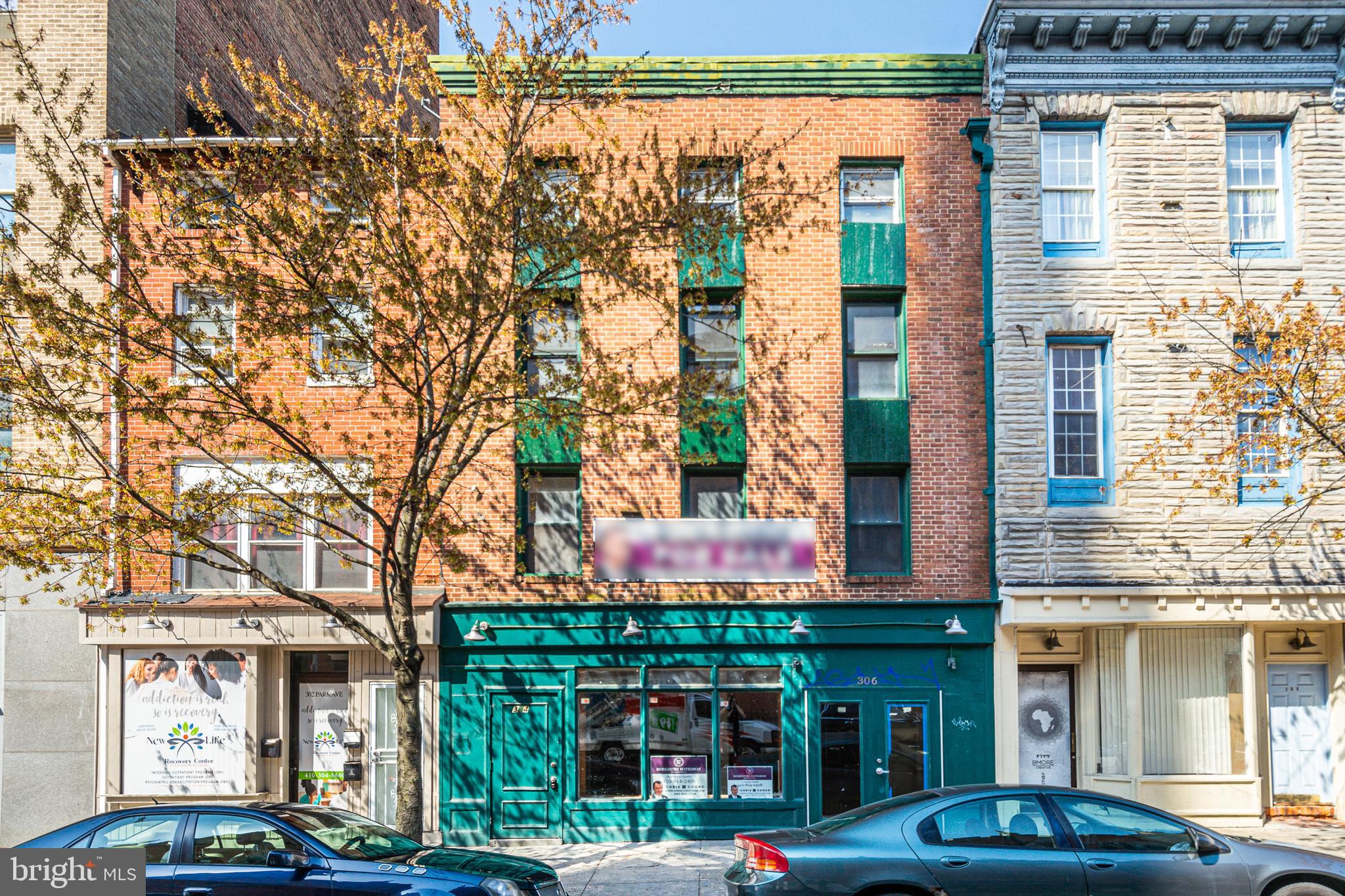 INCREDIBLE INVESTMENT OPPORTUNITY - 4,000 SQ. FT. MIXED USE BUILDING CONSISTING OF A LARGE COMMERCIAL SPACE AND 2 APARTMENTS!  The main level features and open commercial space that's perfect for a retail store of offices and has 2 half baths.  The 2nd level has a 2 bedroom, 1 bath apartment with a living room and kitchen.  The 3rd and 4th level has an additional 2 bedroom, 2 bath apartment which features a large living room w/ vaulted ceilings and a primary bedroom w/ full bath.  Located in a prime location in the heart of China town with high street visibility and walkability to Mercy Medical Center and downtown Baltimore attractions!