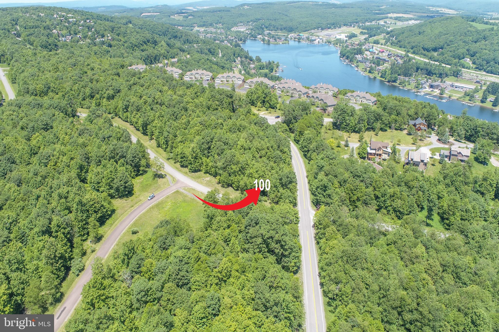 Prime mountain homesite in the Highline community @ Deep Creek Lake!  Discover the perfect place to build your dream retreat in the heart of one of Deep Creek's premier mountain resort communities. This scenic 0.57-acre homesite offers an exceptional balance of everyday convenience, recreational opportunity, and year-round adventure – all in an unbeatable mountaintop location.  Ready for your custom build, this resort lot includes water / sewer taps and offers community paths leading to the Wisp Ski Slopes—making it easy to hit the powder whenever you please. Embrace the mountain-resort lifestyle with true four-season living, from skiing and hiking to boating, golfing, and more. Nearby attractions include the ASCI Whitewater Course for thrilling outdoor adventures, Lodestone Golf Course for championship-level golf, and Deep Creek Lake State Park for fishing, swimming, and waterfront fun. Whether you're planning a vacation retreat or a full-time mountain sanctuary, this lot is the ideal starting point to bring your vision to life.