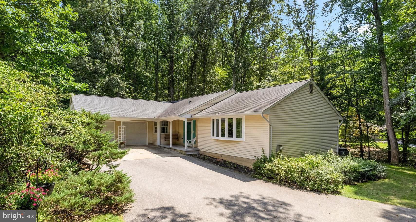 Welcome home! Look no further for perfect 1 level living in Gambrills.  Private wooded lot on over an acre of land.  Charming rancher with 2 car garage & large rear deck perfect for enjoying nature.  3 bedrooms with 2 full and 1 half bathrooms.  Main level offers living room, family room, formal dining room, kitchen along with the bedrooms and baths.  Large lower level is unfinished but spacious. 4th bedroom framed & drywalled just awaiting flooring of your choice.  NEW Crofton High School feeder system. Close to major commuter routes to Annapolis, Ft. Meade, DC & Baltimore. Great shopping, dining & entertainment just minutes away.