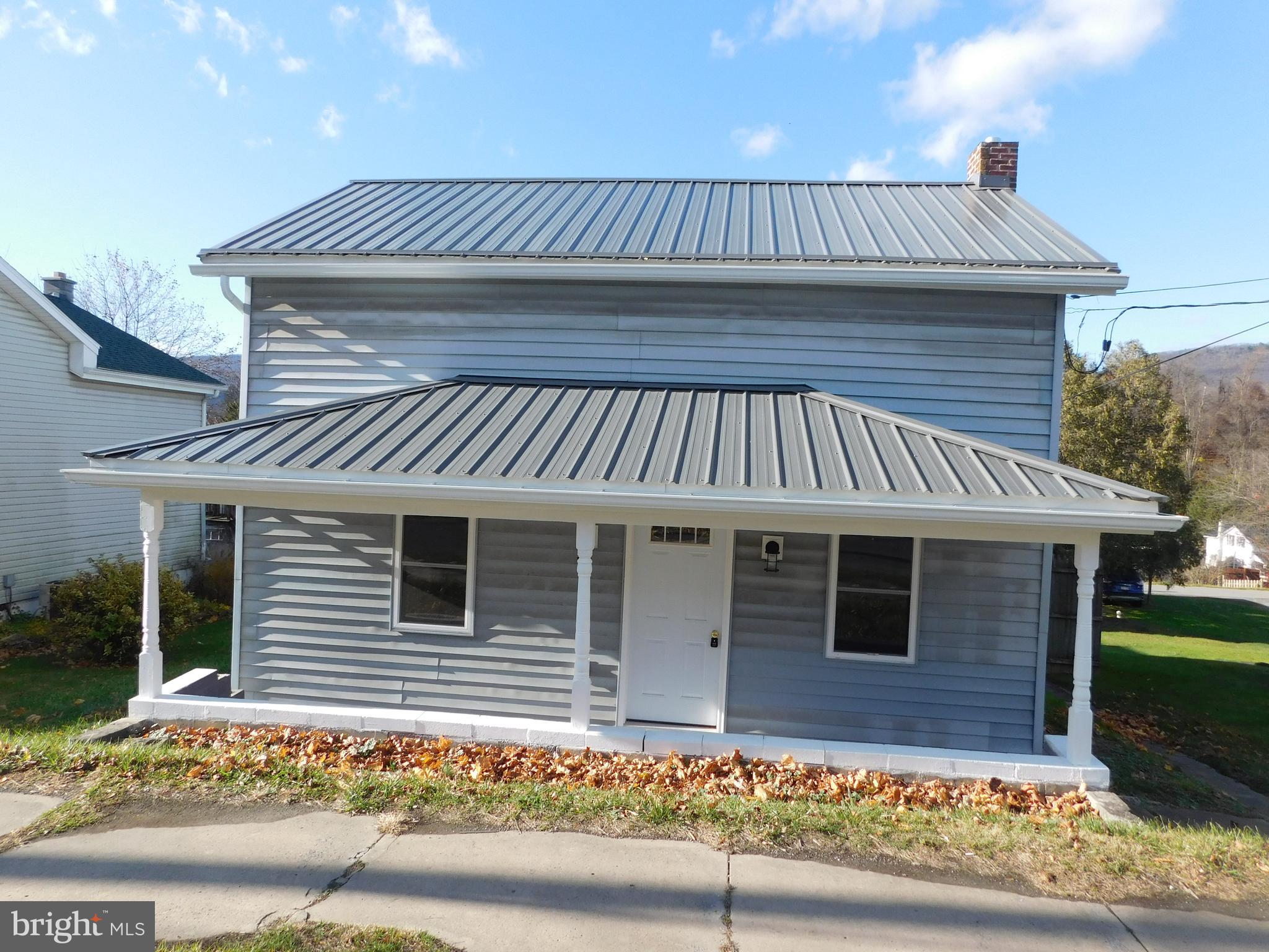 this house was gutted to the studs; new everything on the inside; move right in; 1 car detached garage & carport; new deck
