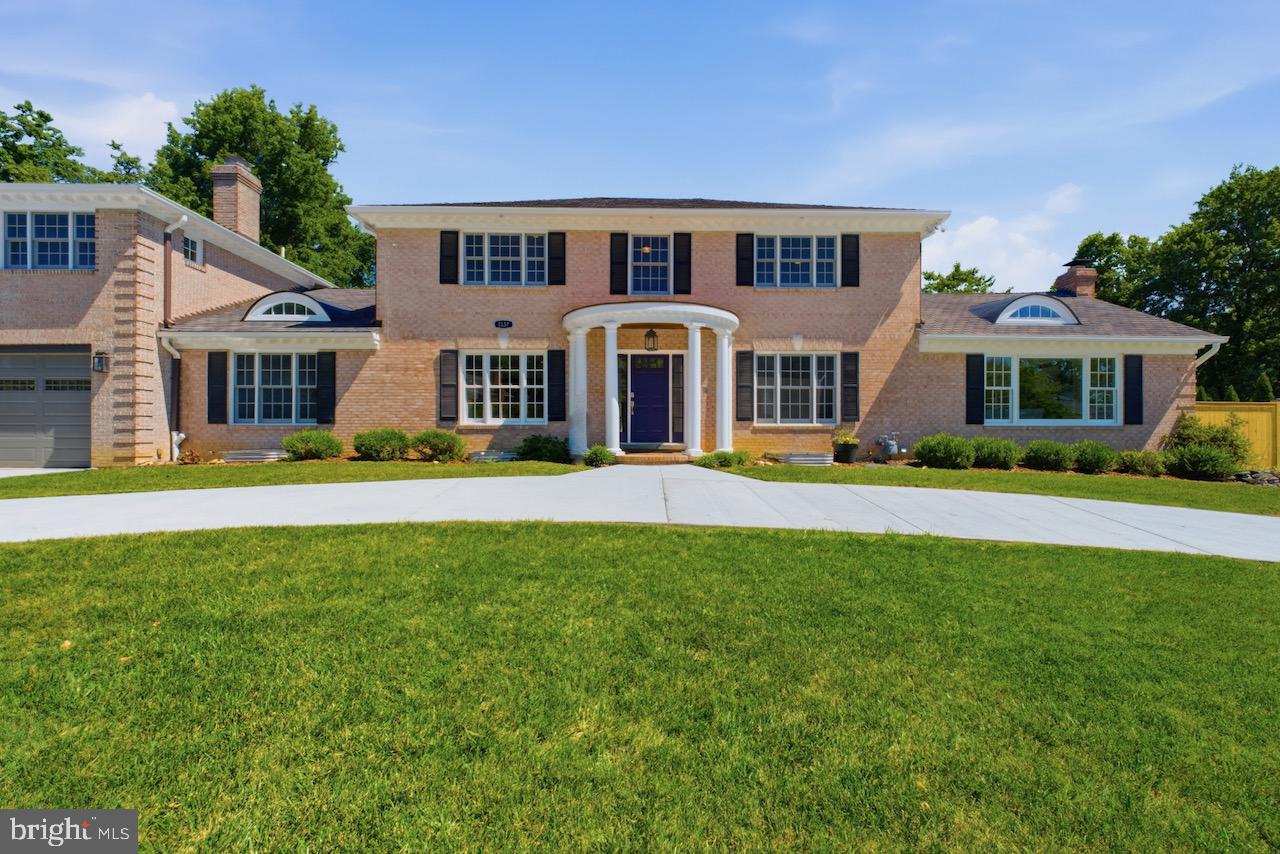 Located on a quiet street with direct access to nearly 21 acres of wooded Forest Park, this exceptional custom residence offers more than 7,400 square feet of beautifully designed living space on a nearly half-acre lot in Alexandria City. Expanded and reimagined in 2011 with an emphasis on quality, scale and timeless design, the home combines gracious entertaining spaces, exceptional functionality and outstanding craftsmanship. A circular driveway, stately columned entrance, oversized two-car garage and manicured grounds create an impressive arrival, while reclaimed hardwood floors, extensive custom millwork, oversized windows, French doors and thoughtfully curated finishes establish an atmosphere of understated luxury throughout. The gracious foyer is flanked by elegant formal living and dining rooms, creating refined spaces for both intimate gatherings and large-scale entertaining. A standout feature of the home is the extraordinary chef’s kitchen, thoughtfully designed for everyday living and effortless hosting. Custom wood cabinetry, expansive granite countertops, multiple sinks, dual dishwashers, wall ovens, oversized center islands, abundant storage, an extra-large pantry and generous preparation areas provide exceptional beauty and functionality, while island seating and a spacious dining area comfortably accommodate large gatherings. The kitchen flows seamlessly into the spectacular family room, where soaring vaulted ceilings, custom built-ins, a dramatic stone fireplace and a wall of French doors overlooking the backyard create an inviting setting for gathering and entertaining. The main level also includes a private office, powder room, mudroom with custom built-ins and slate flooring, spacious laundry room, secondary entry and a sun-filled windowed breezeway that elegantly connects the home’s two wings. The upper level offers a layout rarely found in Alexandria, featuring dual staircases and distinct bedroom wings that provide privacy and flexibility. The primary suite serves as a private retreat with a spacious bedroom, oversized walk-in closet and spa-inspired bath with soaking tub, dual vanities, oversized walk-in shower and private water closet. Five additional bedrooms and a large open loft recreation space offer remarkable flexibility for family, guests, offices, study areas, fitness or hobbies. The lower level expands the home’s versatility with a dedicated theater room, expansive recreation room with wet bar, additional bedroom and full bath, flex space, substantial storage and an oversized cedar closet. With seven bedrooms, five full baths, one half bath, two wood-burning fireplaces and more than 7,400 square feet of finished living space, this residence offers a level of scale seldom available in Alexandria City. Outside, the nearly half-acre level lot provides exceptional privacy and generous space for recreation, entertaining and gardening. Expansive stone patios create the perfect setting for outdoor dining and summer gatherings, while a new 8' x 12' storage building provides attractive and functional space for gardening equipment, landscaping tools, recreational gear and seasonal storage. All of these impressive features are complemented by an unbeatable location convenient to shopping, dining, parks and everyday amenities. Enjoy easy access to Old Town Alexandria, Del Ray, Shirlington and Washington, D.C., as well as nearby Metro stations, Reagan National Airport, Dulles International Airport and major commuter routes. Properties offering this combination of scale, craftsmanship, privacy and location are seldom available in Alexandria City. 
Brokers Open Tuesday, June 16th, 11-1. Public Open House Saturday, June 20th, 1-3.