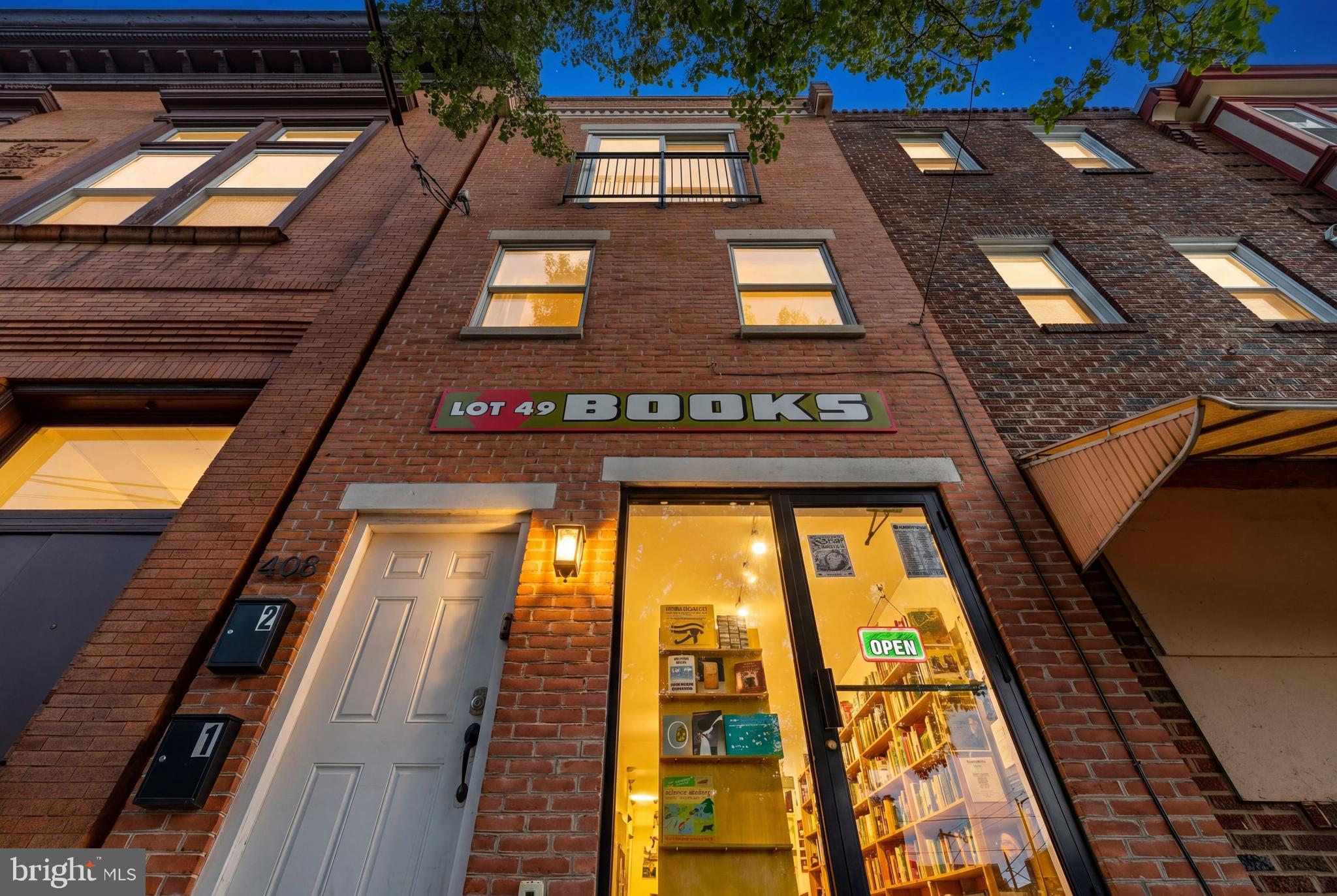 Situated along the vibrant Girard Avenue corridor in the heart of Fishtown, 408 E Girard Avenue presents a rare mixed-use opportunity with exceptional flexibility for investors and owner-occupants alike.
The property features a first-floor commercial space that is currently leased to Lot 49 Books. The tenant may remain in place for a buyer seeking immediate income, or the space may be delivered vacant, creating a unique opportunity for an owner-user or business operator.
Above, the bi-level residential unit offers 2 bedrooms and 1.5 bathrooms, including a Juliet balcony overlooking Girard Avenue and a large private rear deck. The residential unit will be delivered vacant by August 1, providing immediate flexibility for an owner-occupant or the opportunity to secure a new tenant at market rent.
Located in the heart of Fishtown and surrounded by some of Philadelphia’s most popular restaurants, cafes, shops, and entertainment destinations, the property also offers convenient access to Center City, I-95, and public transportation.