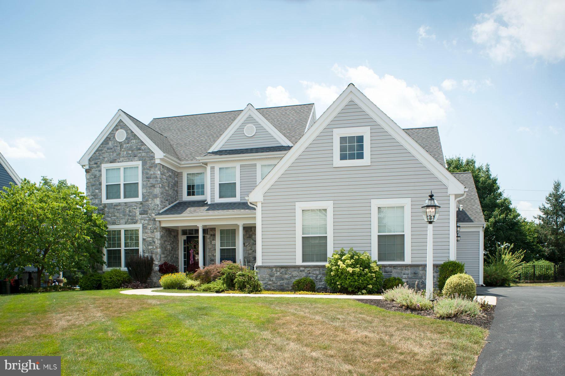 If you want a home in Manheim Township, don't look any further.  This beautifully maintained home has over 3100 square feet of living space above grade and almost 1000 square feet below grade.  With all the amenities and space, your family will feel right at home.  Whether entertaining family and friends or hosting the office cocktail party, your guests will be impressed and your prep in this great kitchen will be a joy.  Stainless appliances, double oven, gas cooking, granite counter and more...  Upon entering the home, you are encountered with an impressive two story foyer and to your left is a library and to the right is the formal dining room.  Walking further into the home, you will experience the open floor concept with a family room, kitchen and breakfast room.  Don't stop there or you will miss the lovely and inviting sunroom.  You can cozy up in this space while enjoying the Rumford wood burning fireplace.  Send the kids upstairs to bed while you enjoy the primary bedroom on the main floor.  This bedroom is spacious with a cathedral ceiling, seating area and walk-in closet.  The primary bath features tile, granite, double sinks and a spacious shower and simply a feeling of luxury.  The upper floor has three bedrooms and a full bath with a private shower and toilet area so sharing this space is a breeze.  The upper floor loft is perfect for reading or a play area for young children.  The below grade area can be used as a family room or more space to entertain-almost 1000 sq. ft.  The wet bar is perfect to mix some cocktails and party with friends.  The below grade has a full bath and a bedroom-perfect for an older child or parent.  And all the storage space is amazing! The home is in the beautiful Landale Community with easy access to shopping & restaurants at Brighton Village or Richmond Square or enjoy charming downtown Lititz-just a couple of miles away. The neighborhood feel is just for you and your family. You can take the community trail on foot or by bike through the old Stonehenge community and right to Reidenbaugh Elementary. You can also enjoy the backyard while sitting on the patio. The backyard is fenced in so the pup and the kids are safe. Nothing seems to be forgotten with this home; so you don't want to miss your opportunity to visit and fall in love.
