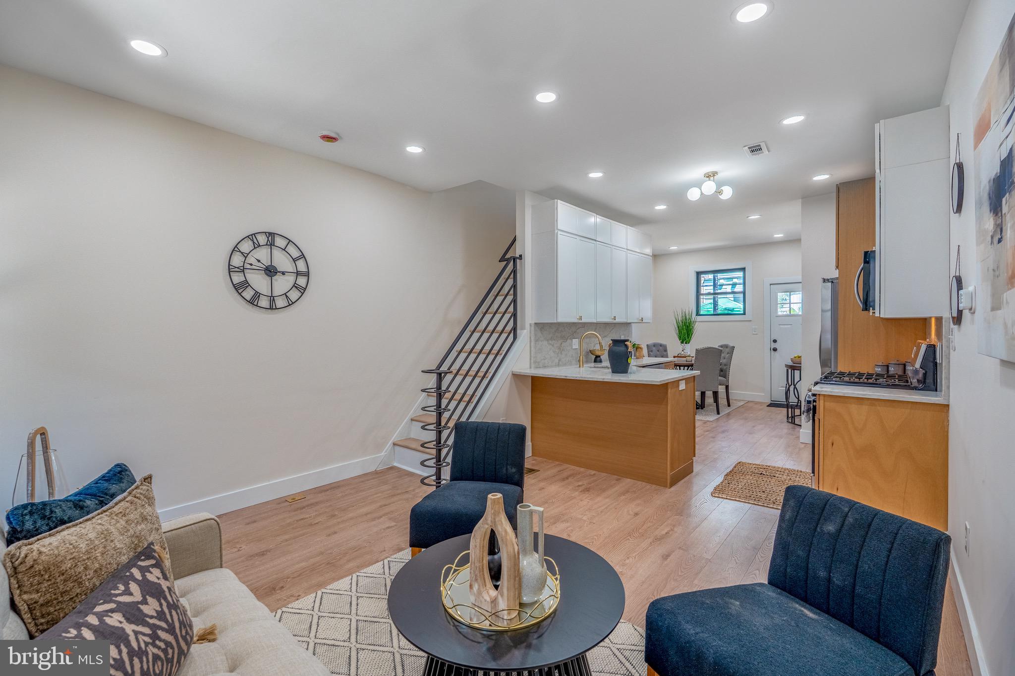 Welcome to 1405 N Corlies Street, a beautifully renovated 2-bedroom, 2-bathroom home located in the heart of Philadelphia's desirable Brewerytown neighborhood. From the moment you enter, you'll appreciate the thoughtful updates and modern finishes throughout. The main level features brand-new laminate wood flooring flowing seamlessly through the spacious living room, dining area, and fully renovated kitchen. The stunning kitchen offers stylish two-tone cabinetry with warm wood-tone lower cabinets and crisp white upper cabinets, complemented by granite countertops, stainless steel appliances, and elegant gold accent hardware and fixtures.
Upstairs, you'll find two generously sized bedrooms, both featuring brand-new laminate wood flooring, abundant natural light, and striking black-framed windows that add a modern touch. The primary suite boasts a beautifully renovated en-suite bathroom complete with ceramic tile flooring, a glass-enclosed shower, double vanity sinks, and dual mirrors, creating a luxurious retreat. The second bedroom is equally spacious and bright, while the hall bathroom has been fully updated with a stylish vanity, ceramic tile finishes, and a tub/shower combination.
Additional improvements include a brand-new HVAC system and a new roof, offering peace of mind for years to come. Conveniently located near Brewerytown's popular restaurants, cafes, parks, and Center City Philadelphia, this move-in-ready home is the perfect blend of modern style and urban convenience.