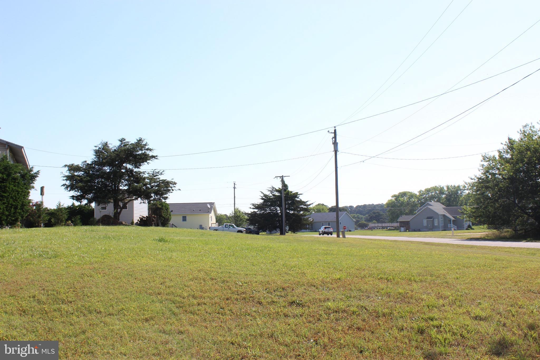 3/1601 Elevated, cleared corner lot with conventional septic system already installed with some views of Swan Gutt Creek in the distance. Lot has water availability and could possibly be connect to sewer with approval from AQUA VA. ESBVA. This lot is in a highly sought after area of Captains Cove, just a short distance to all the amenities.  Seller owns additional lot Sec 4/Lot 2296 Buccaneer Blvd. and is willing to sell as a package deal $25,000. Buy now and build later, take advantage of this great buy! No time frame to build, and no Builder Tie-In. Enjoy all the amenities and the lifestyle on the Eastern Shore of VA. Close to Chincoteague Island, Wallops Island and Ocean City MD. HOA amenities: 9 Hole Pristine Golf Course, indoor/outdoor pools (2), fitness center, basketball & pickle-ball courts, biking & walking trails, boat ramp, docks, playground,dog park, picnic area, security and so much more.