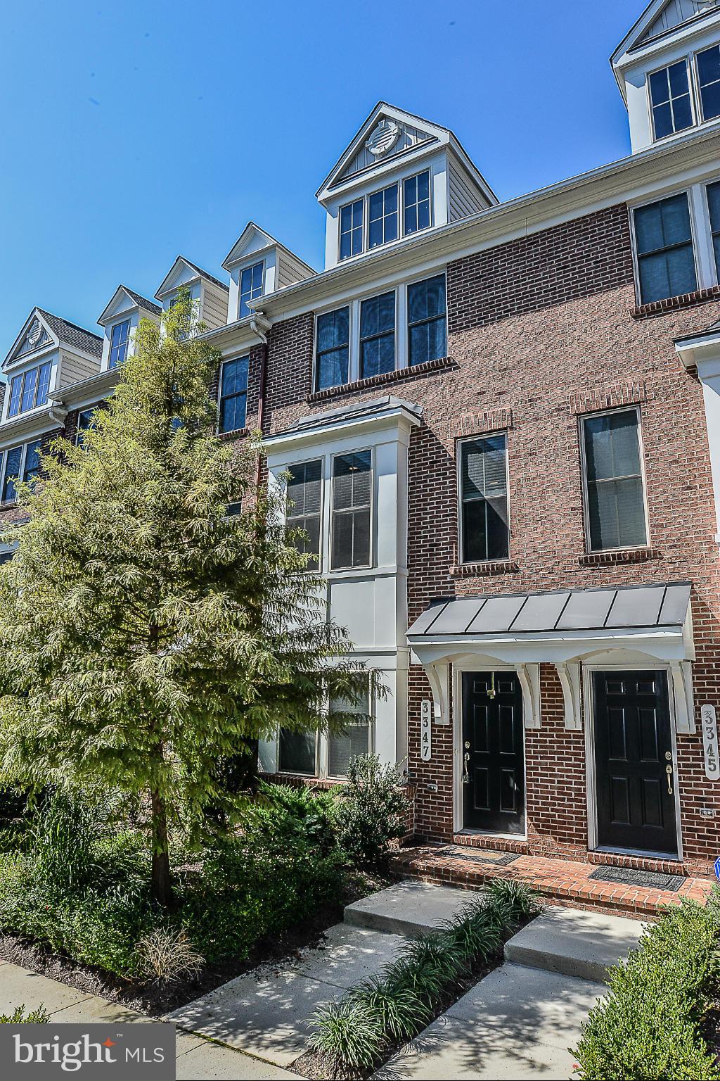 New Price! Luxurious, sun-filled 2 BR, 2.5 BA brick TH with all of the upgrades in Shirlington Crest! Oversized gourmet kitchen w/granite countertops & stainless appliances, 2 story foyer entry, 9' ceilings, high-end finishes & beautiful hardwoods. Large MBR, with walk-in closet, rooftop terrace & 2 car garage.  Custom electric blinds.  Walk to Shirlington Village, parks, and the W&OD trail!