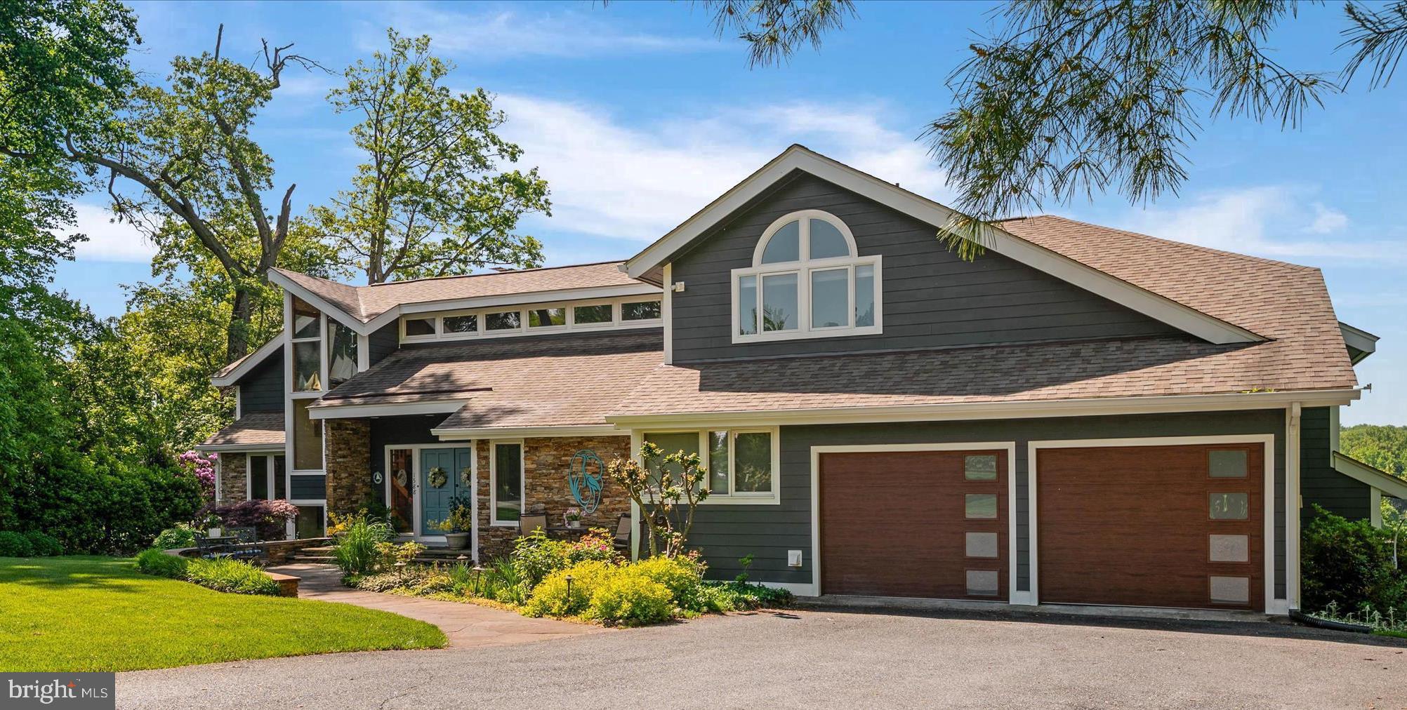 PRICE REDUCTION 245K! Welcome to 1588 Eaton Way, an extraordinary, waterfront Chesapeake Bay retreat offering the very best of Annapolis living. Located in the highly coveted Downs on the Severn neighborhood, this custom California Deck‑style home spans 7,000+ square feet on 2 private acres with deep‑water access (6+ ft MLW) and stunning views of Clements Creek. Designed as a true waterfront estate, this home blends architectural character, thoughtful modernization, and resort‑style amenities—perfect for boating enthusiasts and those seeking a refined Bay lifestyle. Waterfront features a private dock with 50‑amp power boat lift configured for a 21’ vessel (parts available for jet skis or other boat sizes). Deep‑water slips at dock that are over 8 feet+ mean low. The Polaris utility vehicle conveys for easy waterfront access (and snow plow attachments included). Host all your gatherings at the park like waterfront dock.  This home is truly special & unique compared to most other waterfront homes!


There have been major improvements in this 6-bedroom waterfront home. There are water views from nearly every room! This home features Hardie Plank siding with vinyl‑wrapped trim in 2024, new roof system in 2021— not just shingles, and four new garage doors & openers. There is a Sub‑Zero refrigerator/freezer installed in 2021, updated dock electrical & lift adjustments, new wood‑burning stove at lower‑level club/bar. The primary suite bath was a complete down‑to‑the‑studs renovation featuring steam shower, deep soaking tub, towel warmer, and Onii toilet/bidet. The Jack‑and‑Jill bath renovated with Jacuzzi tub, rain shower, hand shower, and towel warmer. This home has a beautiful, private layout that combines style & comfort for everyone.

The interior highlights are custom architectural design with knotty pine ceilings throughout,  two‑sided stacked‑stone wood‑burning fireplace. There is a fully updated kitchen, central vacuum system with outlets throughout home and garages, central audio system with controls indoors and out, and RV‑sized garage with power! The upper garage equipped with hot & cold water plus floor drains—perfect for year‑round vehicle care!  Where else can you find that?

There have been several updates on the home at 1588 Eaton Way. The kitchen has instant hot water dispenser. The updated outdoor lighting is new. There is restored hardwood flooring throughout home, and new carpeting. The systems in the home have all been meticulously maintained. There are all new skylights and most all of the windows & some doors throughout the home! There is professionally maintained 12‑zone irrigation system for upper and lower lawns and is seasonally serviced.

This tranquil Severn River location offers breathtaking water views, abundant wildlife, and easy access to downtown Annapolis, the Chesapeake Bay, and major commuter routes—without sacrificing privacy or serenity. 1588 Eaton Way is a rare opportunity to own a meticulously maintained, deep‑water estate in one of Annapolis’ most prestigious waterfront communities.

The Downs on the Severn features two community marinas, an outdoor community swimming pool with swim team, tennis courts, pickle ball, and a clubhouse for year-round socials. There are also tot lots for the little ones, and a little library. The Downs is an easy commute to Baltimore, DC and the beaches.  The airport is less than 30-minute drive.  This is truly a resort vacation at home in the Downs on the Severn! HOME IS BEING SOLD AS IS. Contact listing agent for details!