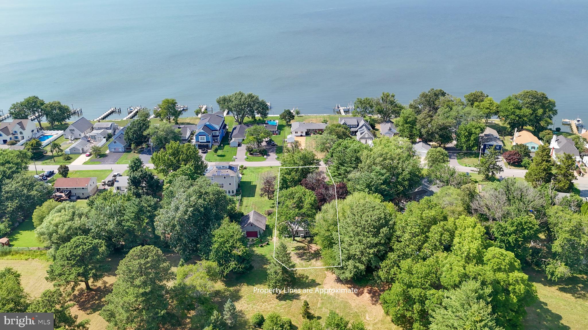 Come discover this charming water view cottage nestled in the sought after water privileged Chester River Beach community.  This remodeled & inviting home offers the perfect balance of comfort, convenience & lifestyle with plenty of room to add on or up & expand to capture water views.  This property is on public sewer.  You’ll love spending relaxing mornings or evenings on the front patio or watch the sun set from the waterfront park/boat launch just steps away.  Wonderful location, just minutes away from local parks, marina’s, cross island trail, hospitals, restaurants, shopping, recreational activities & convenient to route 50. 
For a limited time only, four lots including the cottage, totaling 18 acres (which may have further subdivision potential), is being offered at $1,650,000. Potential investment opportunity.