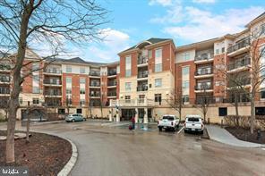 Experience elevated living in this exceptional high-end luxury condo, where comfort, convenience, and sophistication come together seamlessly. This all-inclusive residence (Owner responsible only for electric and internet) offers a truly effortless lifestyle in a premier setting.

Step inside to a spacious open floor plan designed for both everyday living and elegant entertaining. The living areas feature beautiful wood flooring throughout, complemented by a modern kitchen outfitted with sleek stainless steel appliances. Plush carpeting in the bedrooms adds warmth and comfort, creating a perfect retreat at the end of the day.

Enjoy your morning coffee or unwind in the evening on your private balcony, offering a peaceful extension of your living space.

Residents benefit from an array of upscale amenities, including:
24/7 doorman service ensuring convenience and security
Secure garage parking with one dedicated space
Easy access elevators conveniently located near all garage areas
Indoor pool for year-round enjoyment
Fully equipped 24-hour fitness center
Stylish community room ideal for gatherings and events

Perfectly situated just moments from public transportation and a variety of shopping destinations, this condo offers both luxury and accessibility in one exceptional package.

Don’t miss the opportunity to live in a residence that truly has it all.