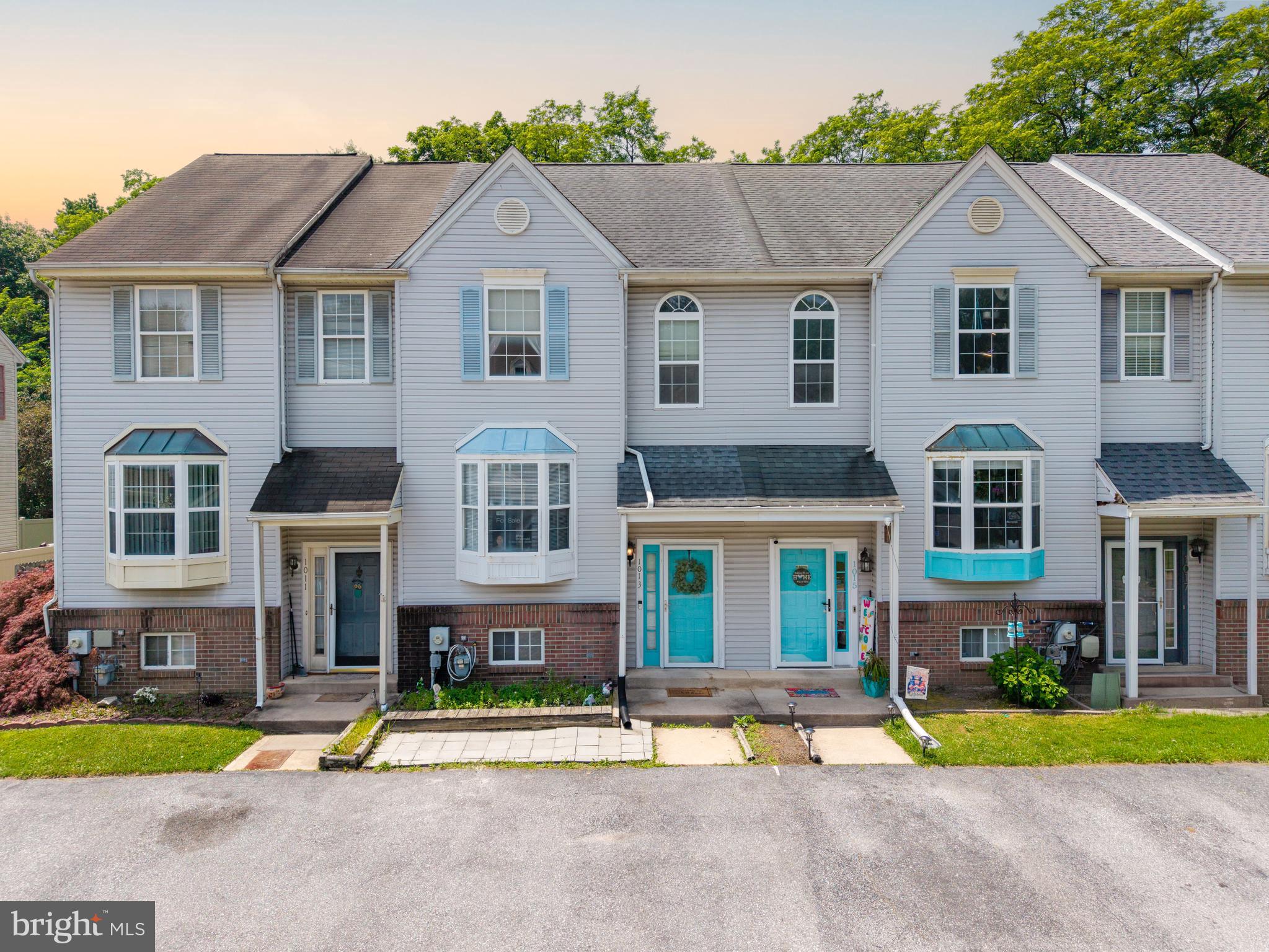 Welcome home to this clean and well maintained 2 bedroom, 1.5 bath townhome tucked away on a private dead end street in Pinewoods. Backing to mature trees, this home offers both privacy and convenience close to parks, shopping centers and major highways. 

The main level is filled with light featuring a spacious living area and a bright kitchen with a charming bay window, plenty of cabinet space, and all appliances included, even the washer and dryer, making this home truly move in ready.  The air conditioner was recently replaced in 2025 and the deck was replaced in 2020. 

Upstairs, the primary bedroom with skylights that fill the space with natural light, a walk-in closet, and plenty of room to unwind. A second bedroom and full bath complete the upper level.

The unfinished walk out basement provides a dedicated laundry area along with ample storage space and direct access to the backyard. Outside, enjoy your own private outdoor area with a deck and fully fenced yard perfect for relaxing and entertaining.

Located in the conveniently situated Pinewoods community, you'll be just minutes from shopping, parks, dining, and major highways while still enjoying the peaceful setting of this tucked-away location. Don't miss your opportunity to make this inviting home your own!