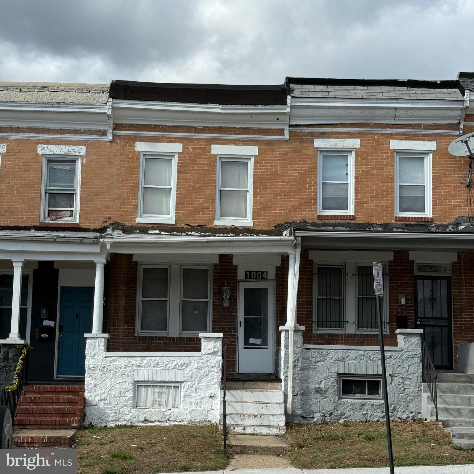Traditional Row home ready for you to finish updating. Wood floors on both first and second levels. Full unfinished basement.  Water Heater 2019.  As is clause required. Great investment opportunity for rental or resale.  Three bedrooms upstairs with one full bath.  Back porch looks out to city park where concerts and picnics take place.  Great central location!