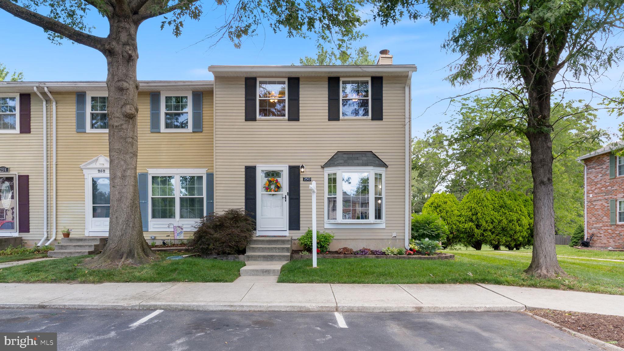 Welcome to 250 Chalet Cir. W, Millersville, MD 21108 — a rarely available, move-in ready end-unit townhome in the sought-after Village of Old Mill community offering updated living space, a finished basement, and exceptional commuter convenience between Annapolis, Baltimore, Fort Meade, and Washington, DC. This 3-bedroom, 1.5-bath home offers more than 1,900 square feet and presents an affordable opportunity to own in a prime Anne Arundel County location with low-maintenance living.
This end unit home provides additional privacy, abundant windows, natural light, and a desirable setting backing to open common space. The owners have updated the kitchen, creating a modern and functional space with upgraded cabinetry, stainless steel appliances, ample countertop space, and an eat-in dining area ideal for everyday living and entertaining. The spacious main level also offers comfortable living and dining spaces with wood flooring and an excellent flow throughout the home.
Upstairs, you’ll find three generously sized bedrooms, including a spacious primary bedroom with a walk-in closet. The finished lower level, with brand-new carpet (2026), significantly expands the home’s usable living space and features a cozy wood-burning fireplace, recreation area, half bathroom, laundry area, and flexible space ideal for a home office, gym, guest area, playroom, or additional entertaining space.
Outdoor living includes a fenced in backyard and a rear deck overlooking open common space, creating a peaceful setting for relaxing or entertaining.  The heat pump was replaced in 2024
The Village of Old Mill offers a low-maintenance lifestyle with condo fees covering exterior maintenance, roof, lawn care, water, sewer, snow removal, and common area maintenance, helping reduce maintenance responsibilities and monthly ownership costs. Membership opportunities are also available for the Olde Mill Swim Club and the Village of Old Mill Community Association, providing additional recreational and community amenities for residents.
Ideally located in Anne Arundel County, this home provides excellent commuter access throughout Central Maryland. Commuter distances include:  approximately 8 miles to Fort Meade; 15 miles to Annapolis; 16 miles to Baltimore; 28 miles to Washington, DC; and approximately 10 miles to the Coast Guard Yard. The home also offers convenient access to Routes 100, 97, 32, and I-97, making commuting throughout the region exceptionally convenient.
Homes offering this combination of move-in ready condition, finished living space, end-unit privacy, an updated kitchen, and central commuter access are rarely available at this price point in Millersville. If you’re searching for a move-in ready townhome with flexible living space, low-maintenance ownership, and strong commuter convenience, 250 Chalet Cir. W is a must-see.