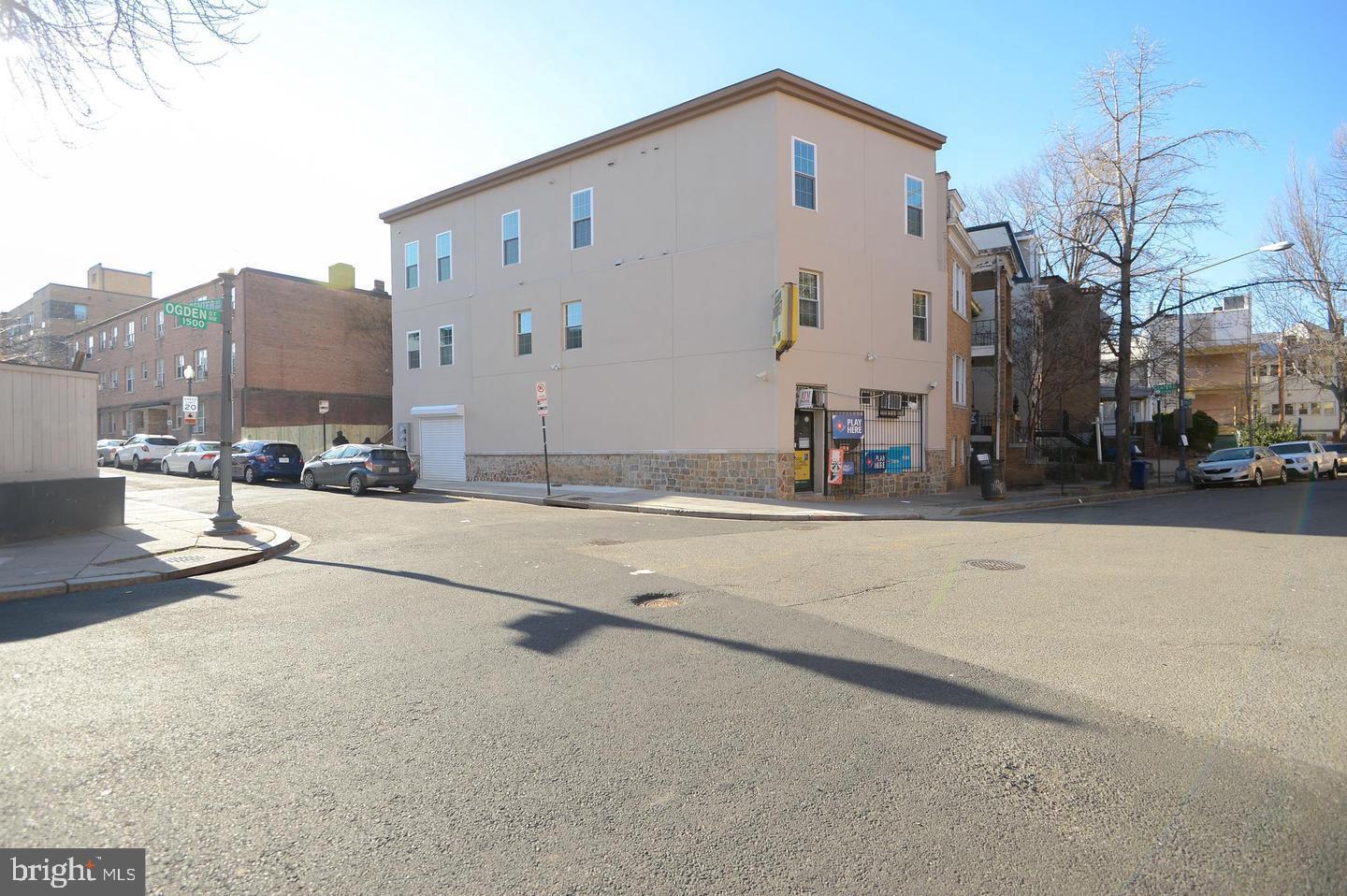 NEW PRICE! Discover 1500 Ogden St NW , a premier mixed-use in the Columbia Heights of Washington DC. 3 Unit Corner Investment Opportunity. 1 Retail / Convenience Store and 2 VACANT residential apartment units, Three bedroom, three bathrooms, each units ranges from 1,000 - 1,250 SF, recently renovated  with washer & dryer in unit, separate electric, secured gate entrance, enclosed rear patio   Located across from bus routes and 2 blocks from the Columbia Heights Metro, Target Shopping center, Starbucks and Trader Joes. The second and third levels are vacant, NO TOPA / DOPA. Carbon Monoxide Detector(s), Smoke Detector, Sprinkler System, New windows, new HVAC units. Additional bonus 600 SF rectangular, adjacent vacant lot that could be used for ample off-street parking (3-4 cars)