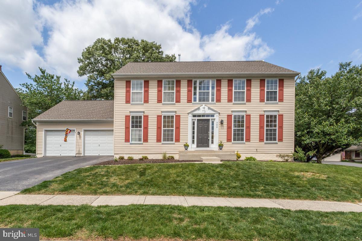 Welcome to 308 Arlington Court — a stunning Colonial nestled in the highly sought after neighborhood of Patuxent Glen. This spacious 4 bed/3.5bath home features gleaming hardwood floors and fresh paint throughout, creating a bright, modern feel from the moment you enter. The chef-inspired kitchen features upgraded quartz countertops, a custom tile backsplash, stainless steel appliances, and an open layout that flows seamlessly into the sun-filled family room. A formal dining room, elegant living room, and convenient main-level laundry complete the first floor. Upstairs the Primary suite features vaulted ceilings, and spa inspired bath with soaking tub, walk in shower, and a generous closet space. The fully finished basement offers a large rec room, full bathroom, and a private office that could easily serve as a fifth bedroom.  Outside is your own personal retreat complete with a large deck, pool, and a private patio making this the perfect house for entertaining!
