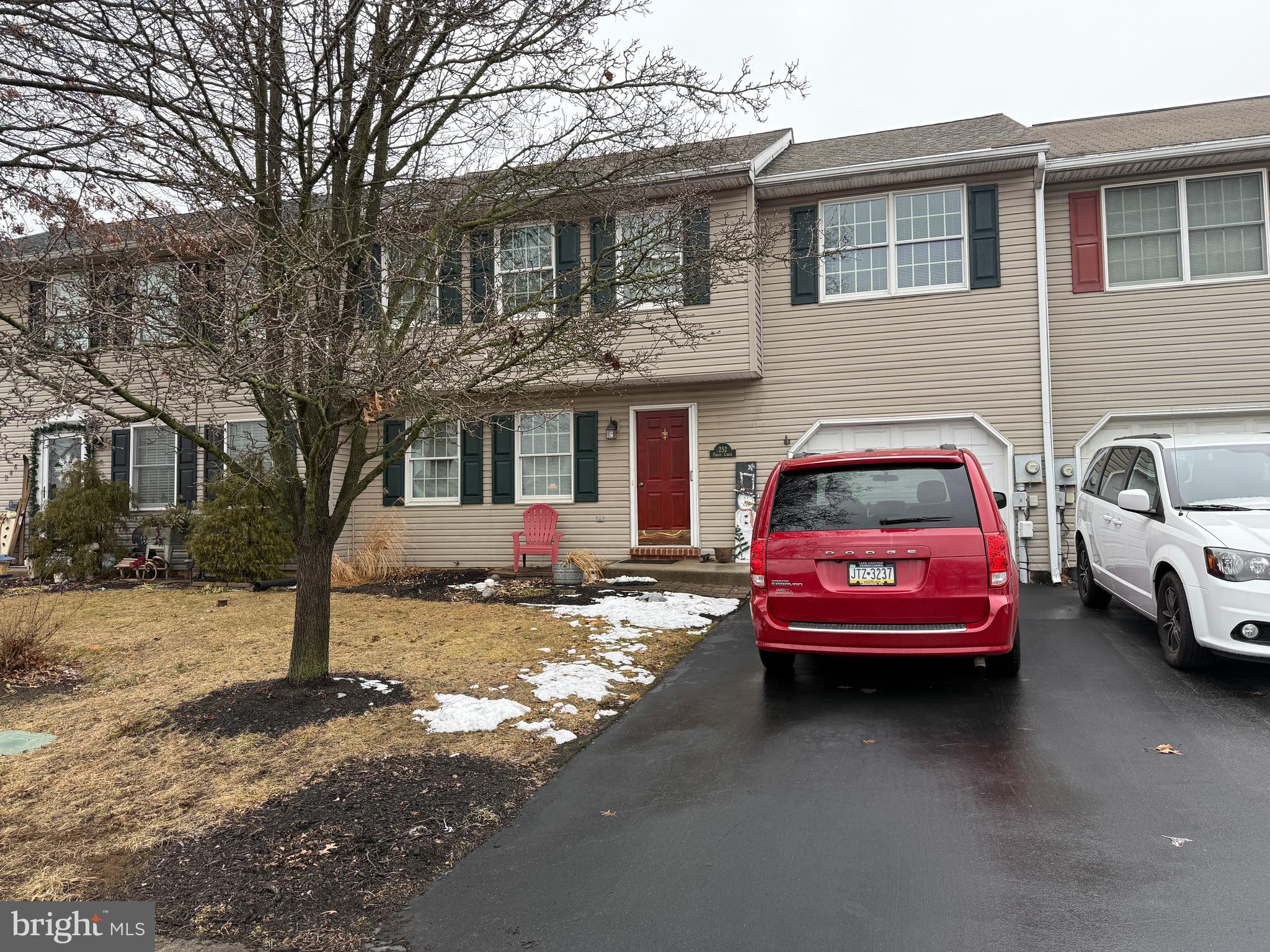 NEW ADJUSTED PRICE! SPACIOUS, CHARMING & MOVE-IN READY in the sought after Breezewood Forest community! 2-Story 4 bd, 2.5 bath, Townhome! This inviting residence boasts generously sized rooms & ample storage in a meticulously maintained setting. One of the few models featuring 4 SPACIOUS BEDROOMS, yes-4! 2.5 baths, along with a finished basement! The warm ambiance of the lovely Living room greets you, where bright laminate floors flow seamlessly into the open dining area. The dining room is flooded with natural light, thanks to sliding glass doors that lead to a large deck (to be painted when weather permits)  & nicely landscaped, fenced yard—perfect for outdoor entertaining & space for play. For cooking enthusiasts, the roomy oak kitchen offers an ideal space to whip up your favorite meals. It includes a pantry for additional storage, a large island with countertop workspace, above range microwave, smoothtop ovenrange, & extra cabinets w/ SS frig included. A convenient laundry (washer & dryer included) area & half bath are located on the first floor, just off the back entrance access to back yard. Ascending to the 2nd floor, you'll discover a spacious primary suite complete with a fantastic walk-in closet. The primary bath features a brand-new walk-in shower with elegant glass doors & skylight to let the sunshine in. You'll appreciate the size of the 3 additional gracious bedrooms! The pull-down attic provides extra storage—an uncommon find in a townhome. But that’s not all! The lower level features a partially finished family room equipped with built-ins and an under-stair closet for creative storage hideaway. The basement also includes additional unfinished space perfect for storage & workshop area, complete with shelving & a workbench. Nestled on a extra-large quiet cul-de-sac, this home offers ample parking & room for little ones to learn to bike! The roof was recently replaced in 2011, ensuring peace of mind. Enjoy the economic benefits of warm gas heat & cool central air conditioning. Convenient Handi-cap stair lift! (can be removed if requested). This sought-after community features sidewalks & streetlights for leisurely strolls. Conveniently located near major roads, popular restaurants, & shopping amenities, PLUS just moments away from the exciting adventures at Hershey Park “The Sweetest Place on Earth”! A wonderful place to call home!
