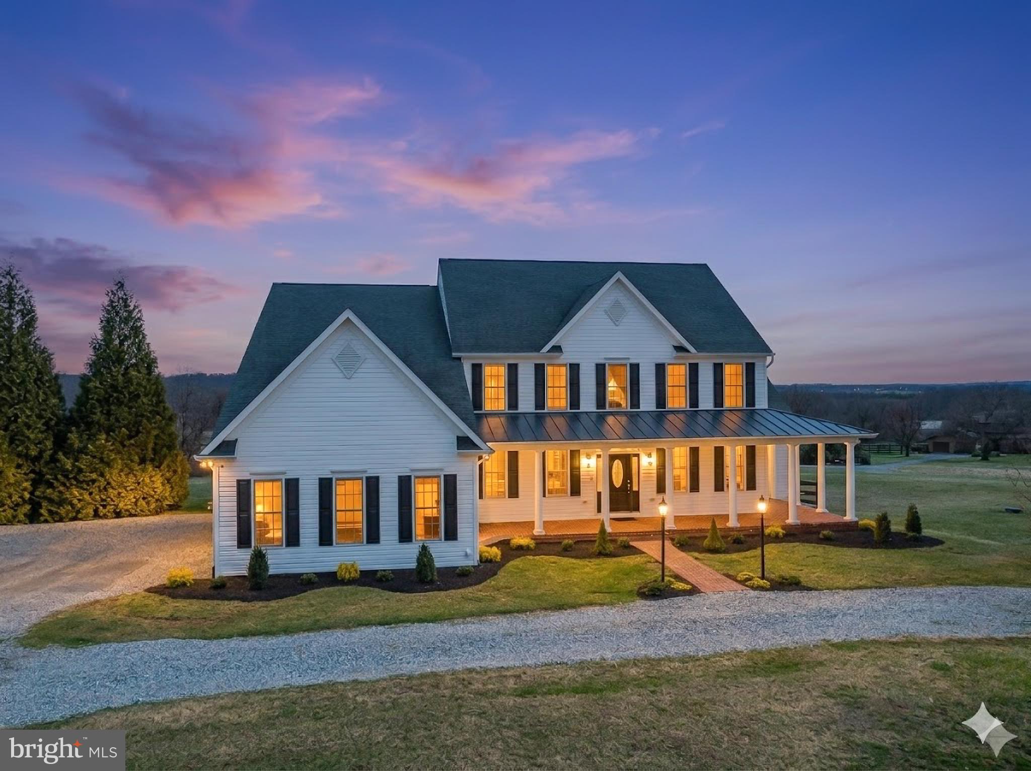 Offer deadline 5pm Saturday. Tucked into the rolling countryside of Bluemont,VA, just minutes from Purcellville, this exceptional fully custom home built by Graystone Homes offers a rare blend of craftsmanship, privacy, and breathtaking natural beauty. Thoughtfully sited on 10.7 acres to capture spectacular 360-degree mountain and pastoral views, the home was designed to maximize light, space, and the surrounding landscape while providing complete privacy to the rear of the property. All with no HOA!
Inside, the home showcases refined architectural detailing and high-end finishes throughout, including hand-stained red oak hardwood floors, soaring 11-foot ceilings, extensive crown molding, wainscoting, transom windows, and beautifully designed living spaces that flow effortlessly for both everyday living.
The professionally designed kitchen is the centerpiece of the home, offering custom cherry cabinetry, personally selected "Rainbow" Granite Counters, abundant prep space, a large island, walk-in pantry,  Bosch appliances sub zero refrigerator drawers, and GE Trivection ovens. An open-concept layout connects the kitchen to the breakfast nook and family room, creating a warm and inviting gathering space highlighted by one of the home’s three gas fireplaces.
Designed with flexibility in mind, the home features 2 primary bedroom suites, one on the main level with a sitting room and gas fireplace and one on the upper level -both with walk-in closets and en-suite baths. A quiet home office with custom built-in cabinets and accent lighting. A music room, just off the foyer is accented with a chandelier and crown moulding.  A full laundry room on both the main and upper level, and beautifully scaled rooms ideal for modern living.
The lower level offers exceptional recreation and entertainment spaces including a billiards room, bar area, game room with fireplace, and a custom theater featuring a Sony HD projector, Dolby surround sound, tiered seating and light up candy bar. There is a 5th bedroom or gym on the lower level and a wall of windows brings in lots of natural light and offers direct walk out access to the fenced back yard. A new deck ( 2025) to enjoy star gazing. Enjoy summer evenings relaxing in the screened in porch. 
Beyond the main home, a separate oversized garage has 3½ bays with Epoxy Flooring, extra height for RVs, boats, or vehicle lifts and a second-story unfinished space designed for a future apartment or studio. 

The property is equally impressive outside, offering ample space for gardens, vineyards, horses, or recreational amenities such as a pool, tennis court, or sport court, all set against the dramatic views of the Blue Ridge.

Modern comfort is ensured with extensive whole-house smart systems, including Sonos digital audio, whole-house water softening, electronic air cleaning, humidification, structured wiring for home Ethernet, Guardian security system, and a 20KW automatic Siemens Generator, along with three-zone high-efficiency HVAC, Andersen Windows, 600 AMP electric service and On -Demand hot water heater, and (2) 1000 gallon in ground propane tanks. High Speed Internet by All Points 5G.  Convenient location in walking distance to Bluemont Montessori School, Bluemont Community Center-child care and classes/ activities, and Bluemont Country Store. Outdoor enthusiasts will enjoy a hike at nearby Bears Den or the Appalachian Trail or paddle the Shenandoah River. Minutes to Purcellville Grocers, Franklin Park Pool and Theatre. Despite its peaceful setting, the property offers convenient access to Route 7. Easy reach of Leesburg, Dulles Airport-30 min, and Washington, D.C., providing the perfect balance between countryside serenity and everyday accessibility.
A rare opportunity to own a meticulously built custom estate in the heart of Virginia’s wine and hunt country, where sweeping views, thoughtful design, and exceptional quality come together to create an extraordinary place to call home
