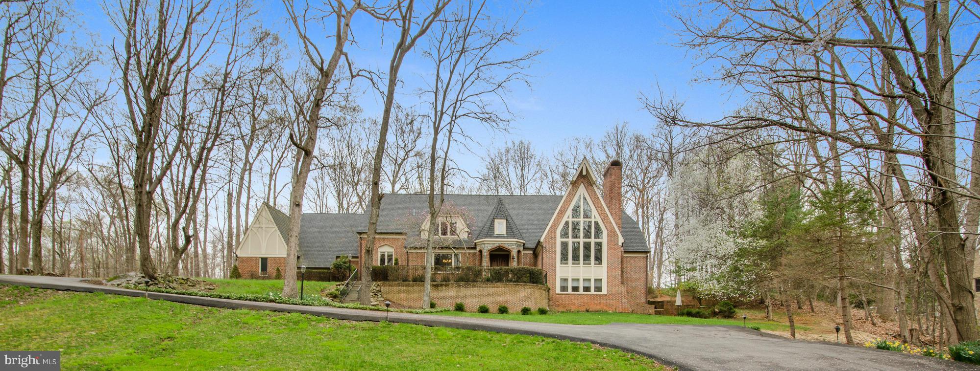Located on 2 acs in the heart of Potomac, this Crowell and Baker built home has 10,000+ square feet of finished space. Paneled library, two master suites, large living room and dining room, finished walkout lower level, 3  car garage are only a few of the features. The backyard ,too, is special with a 1700 sq. ft. flagstone patio with lily pond, fountain, outdoor lighting. and wrought iron gate..