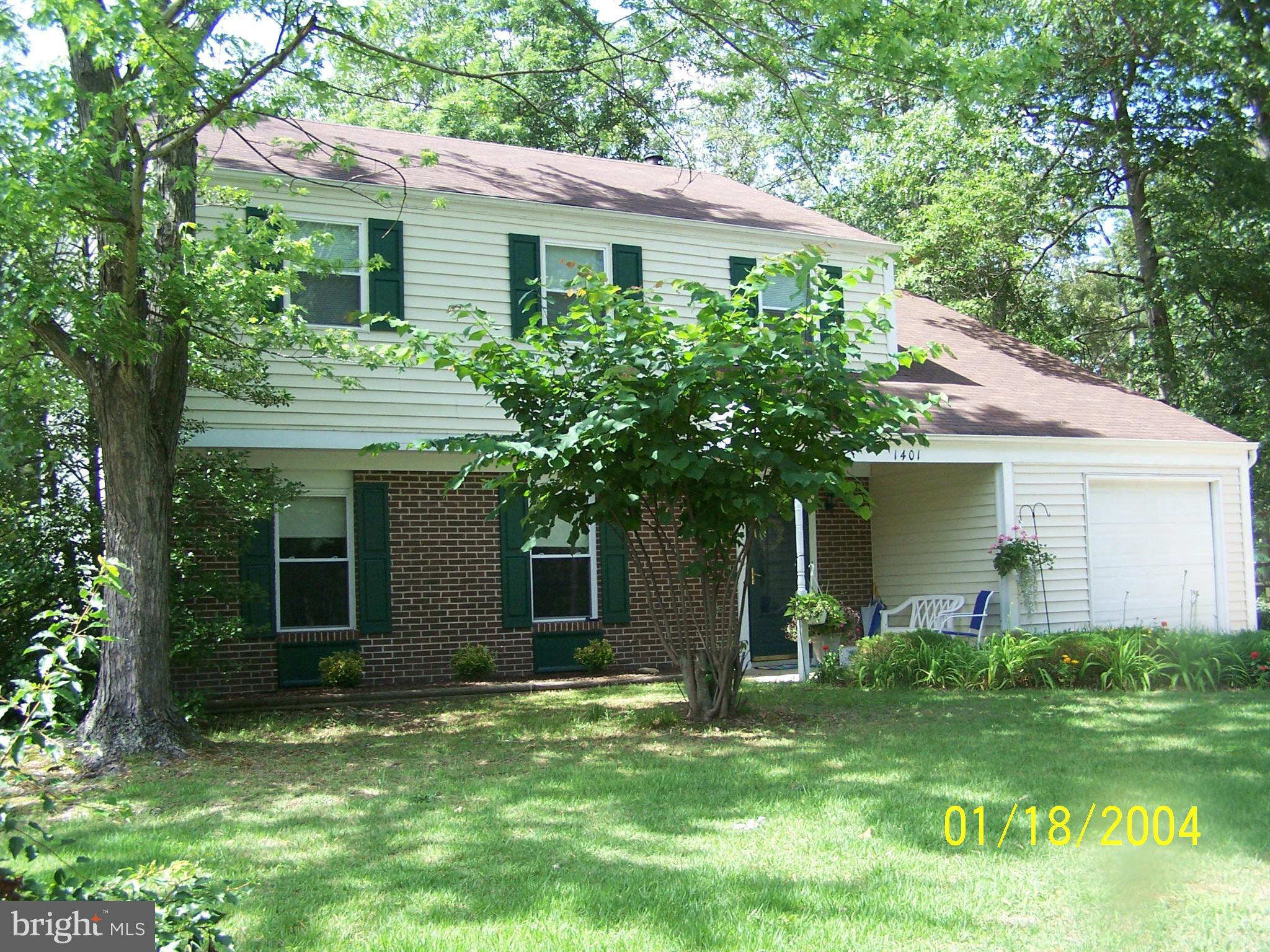 ROOMY COLONIAL on 1/2 ac.of grassy play area.. Conv. to Mall, 25- 35 minute drive to Capitol or National Harbor. 4 lrg Bdrm, 2.5 baths..Recently remdld Country Kitchen with Oak cabinets, Oak corner cabinets, hutch,  table and chairs Convey.  Great Fam Rm/w Brick Fireplace nestled btwn built-in Oak book cases..Leads to patio and Lg back yd/w Woodset swing & Play Station. Fenced on 3 sides, Shed.