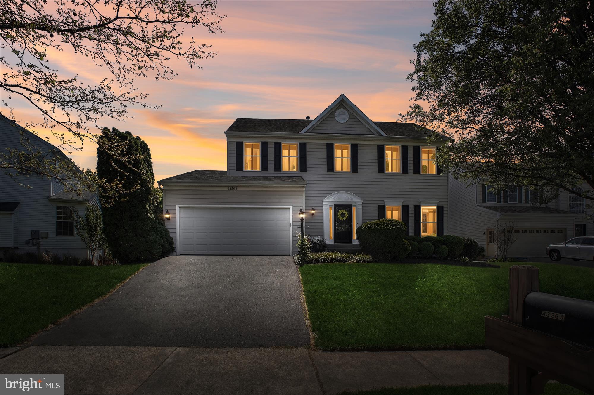 Welcome Home to this lovely Colonial in Ashburn Farm offering 4 bedrooms, 3.5 bathrooms, a 2 car-garage with over 3100 finished square feet on 3 amazingly finished levels.   Inside you'll find a spacious floor plan perfect for every day living as well as entertaining family and friends.  The main level offers refinished hardwood floors, custom paint, a spacious office, half bath, laundry/mudroom , separate dining room with crown molding, and a sun-filled family room with gas fireplace, crown molding and custom paint which opens to the kitchen complete with center island, stainless appliances, granite counters, and recessed lights. Upstairs the primary suite includes new carpeting, a walk-in closet, ceiling fan, and en-suite bathroom with dual sink vanity, soaking tub, and separate shower.   3 additional bedrooms all with ceiling fans and new carpeting as well as a 2nd full bathroom with tub/shower completes the lovely upper level.   The fully finished walkout lower level boasts a 3rd full bathroom, exercise room, and expansive recreation room with built-ins and a FANTASTIC custom bar area with plentiful cabinetry, tile backsplash, under cabinet lighting, and beverage fridge.  Outside enjoy the fully fenced rear yard with a custom deck, stone patio, and storage shed ...perfect for outdoor dining, entertaining, or relaxing.  This beautiful  home in Ashburn Farm provides ease of access to the Dulles Greenway, Rt. 7, and major commuter routes as well as ease of access to the W&OD Trail, schools, Ashburn Library, Trailside Park, dining, and shopping. The community itself features wonderful amenities including...Extensive Trails: Ashburn Farm boasts a large network of walking, biking, and exercise trails, totaling nearly 30 miles. Parks and Recreation: The community features multiple tot lots, two large parks, and five ponds, some stocked with fish. Swimming Pools: There are three community pools for residents to enjoy. Other Amenities: Ashburn Farm also offers a fitness center, room rental options, and various community clubs.   Updates to the home provide peace of mind and include...NEW Water Heater -2020; NEW Custom Deck and Patio -2021;NEW Sliding Glass Doors in Breakfast Room and Lower-Level Recreation Room -2021; NEW Window over Kitchen Sink -2021; Refinished Hardwood Floors on Main Level -2021;Stainless Kitchen Appliances -2021; NEW Custom Bar in Recreation Room -2022;NEW Washer and Dryer -2022; NEW Windows in Dining Room and Family Room -2025; NEW Carpeting in 4 bedrooms  -2025; NEW Roof   -2025; NEW Custom paint in foyer, bedrooms, primary bath, kitchen -2025.  With so much to enjoy in the community and surrounding area...there leaves no doubt that there truly is no place like home.