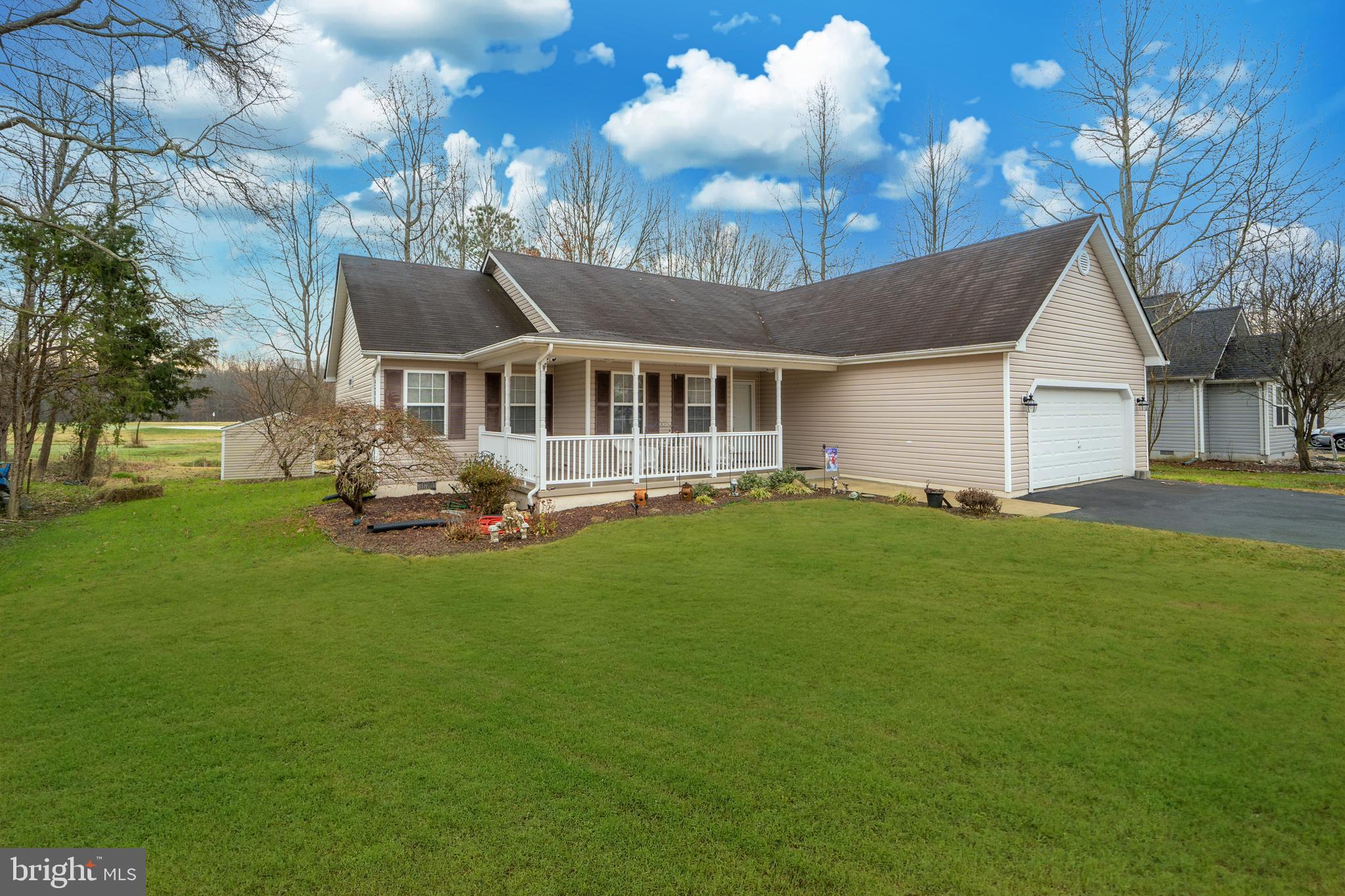 You will not want to miss out on this meticulously maintained Rambler with a split-bedroom design and two-car garage in the sought after Wicomico Shores. Walk in the front door to an open-concept layout with gleaming hardwood floors.  Make your way to the kitchen and fall in love with upgraded stainless steel appliances, granite countertops, pantry, and tons of countertop space... any chef's dream! Spacious family room with an abundance of natural light and a sliding glass door off of the family room leading to a back porch with ceiling fan. Step down the back porch to a large concrete patio on a level backyard overlooking the 14th hole of the beautiful Wicomico Shores Golf Course. This 3 bedroom 2 bath will not last long! SEE AGENT REMARKS!!!!