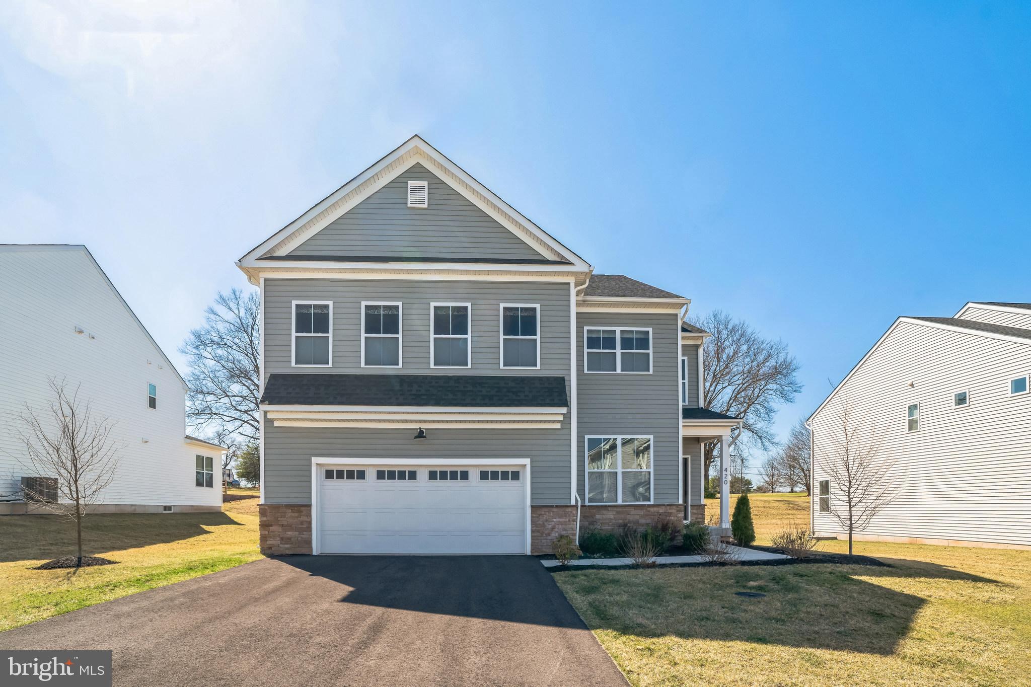 Located in the sought after Spring Ford School District, this 2 year-old home is designed for modern lifestyles. Step inside and you’ll be greeted by a flexible open-concept layout combining the kitchen, living and dining areas with wide plank flooring, quartz countertops and 42-inch shaker cabinets making this home ideal for entertaining. A first floor bedroom with full bath are perfect for overnight guests or those that have difficulty managing the stairs.  Upstairs you will find four bedrooms that share the top floor with the loft, including the luxe owner’s suite with large dual walk-in closets. Enjoy a spa-inspired bathroom in the owner’s suite, with split sinks. With a tankless water heater, running out of hot water is a thing of the past. An unfinished basement waiting to become your next playroom, movie theatre, at home fitness center or maybe all of the above. Out back you will find a 16x20 Timber Tech deck with aluminum railings with light posts, ideal for backyard gatherings. No need to buy a lawn mower as lawn maintenance is included in your HOA, along with trash and common area snow removal. Easy access to 724, 422 and 100 make this the perfect location to call home!