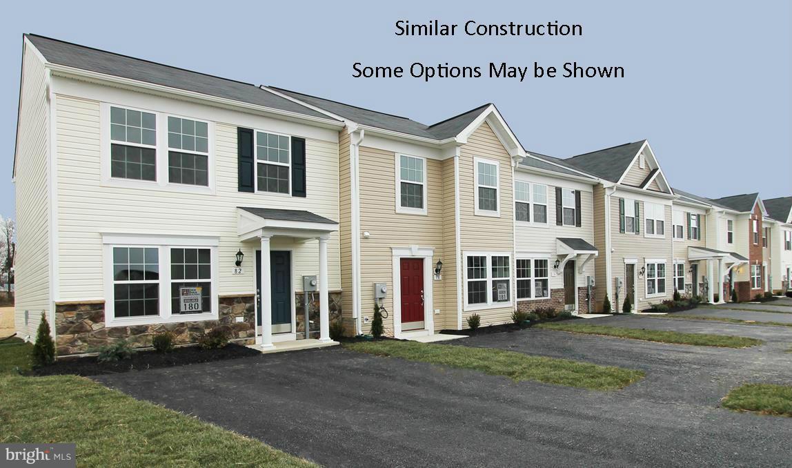 Dan Ryan Builders at Manor Park offers a new set of affordable Madison Townhomes. This attractive unit has shake accent reverse gable front, island kitchen with black Whirlpool appliances & maple cabinets, Owners Suite walk-in closet & double vanity bath, storage shed, private 2car off street parking, HOA mows the grass Right where you want to be near schools, shopping, recreation, I-81!