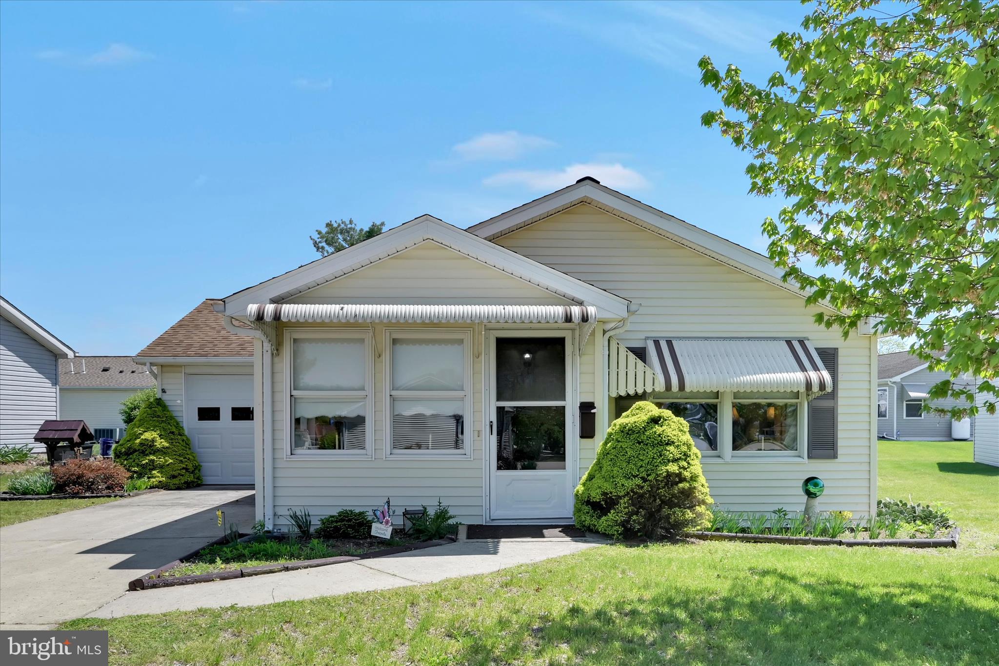 Are you looking for easy one floor living in a 55+ senior community?  Then, welcome to Swatara Village, conveniently located in Pine Grove, PA, just off Route 81 for quick access to shopping, dining, and travel to nearby Harrisburg, Hershey and Lebanon.  This low maintenance & comfortable ranch home offers 2 bedrooms and 2 bathrooms as well as a full size living room, kitchen and separate dining room.  Additionally, there is an inviting enclosed porch in front as well as a mudroom/storage room where you enter the home from the garage.  The bathroom in the primary bedroom has an easy-access walk in shower and the second full bath has a tub.  The laundry closet is readily located in the kitchen.  With just enough yard space to enjoy the outdoors but not too much to mow, this home is ready for you to move in and relax.