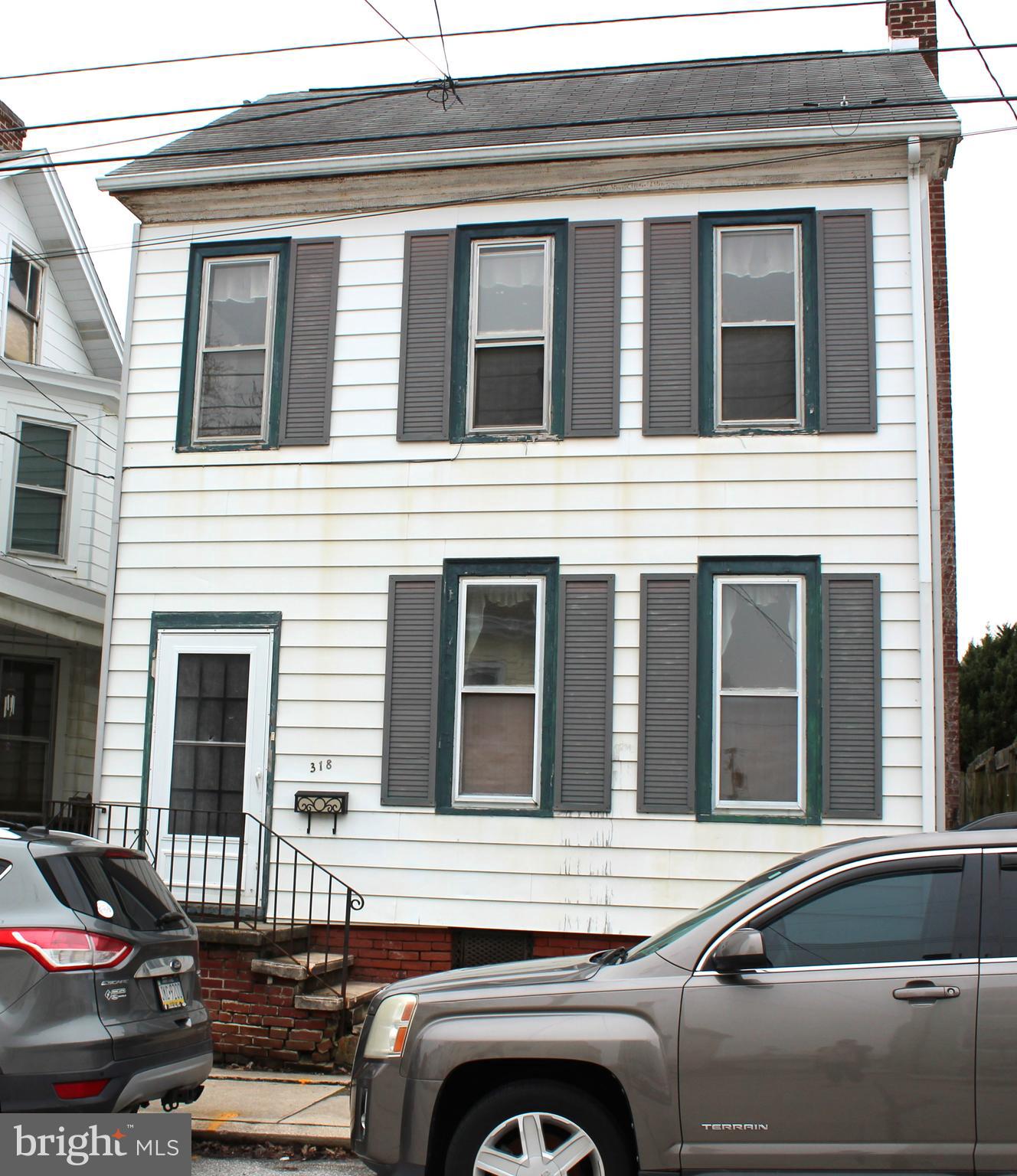 COLONIAL HOME LOCATED NEAR THE HEART OF DOWNTOWN HANOVER.  THIS PROPERTY INCLUDES MUCH OFTHE ORIGINAL COLONIAL CHARM, INLCUDING HARDWOOD FLOORS.  THE FIRST FLOOR OFFERS A LIVING ROOM, LARGE DINING ROOM AND KITCHEN.  TWO BEDROOMS WITH POTENTIAL FOR A 3RD BEDROOM AWAIT ON THE UPPER FLOOR.  THE YARD BOASTS WITH GENEROUS SPACE AND LANDSACPING.  ASPHALT PARKING SPOTS IN REAR OF PROPERTY.  BRING THIS COLONIAL BACK TO LIFE WITH MODERN UPDATES.