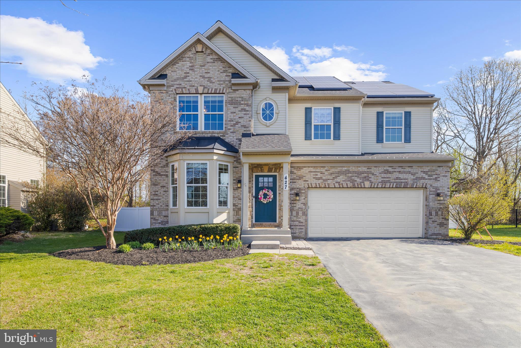 Open House, Saturday, 6/27, 11am - 1:00pm.  Welcome to 427 Brookfield Drive, a move-in ready home in Centreville's sought-after NorthBrook community, offering the perfect blend of space, comfort, privacy, and energy efficiency.

Situated on a premium lot backing to White Marsh Park, this 4-bedroom, 2.5-bath home offers over 2,500 square feet of thoughtfully designed living space with no homes directly behind, providing peaceful views and a private backyard setting.

The main level features a bright, open floor plan ideal for both everyday living and entertaining. The spacious family room showcases vaulted ceilings and a cozy propane fireplace and flows seamlessly into the kitchen, complete with granite countertops, stainless steel appliances, a double oven, and center island. A dedicated home office/flex space and convenient half bath add versatility for today's lifestyle.

Upstairs, the spacious primary suite offers a private retreat with an en-suite bath and oversized walk-in closet. Three additional bedrooms, a full bath, and an upper-level laundry room provide the functionality buyers are looking for.

One of the home's standout features is its energy-efficient solar panel system, helping reduce electricity costs while providing long-term savings and sustainability. Additional recent improvements include a new roof with transferable warranty (2023), luxury vinyl plank flooring (2024), new upper-level carpeting (2026), updated kitchen appliances, a vinyl privacy fence (2022), a new garage door (2024) and freshly painted interior. 

Enjoy all that NorthBrook has to offer, including walking trails, a playground, soccer field, and pavilion. Conveniently located just minutes from Historic Centreville, the Centreville Wharf & Public Landing, local parks, restaurants, shopping, and only 25 minutes from the Bay Bridge.

If you've been searching for a well-maintained, energy-efficient home with modern updates, flexible living space, and a private setting, 427 Brookfield Drive is a must-see.