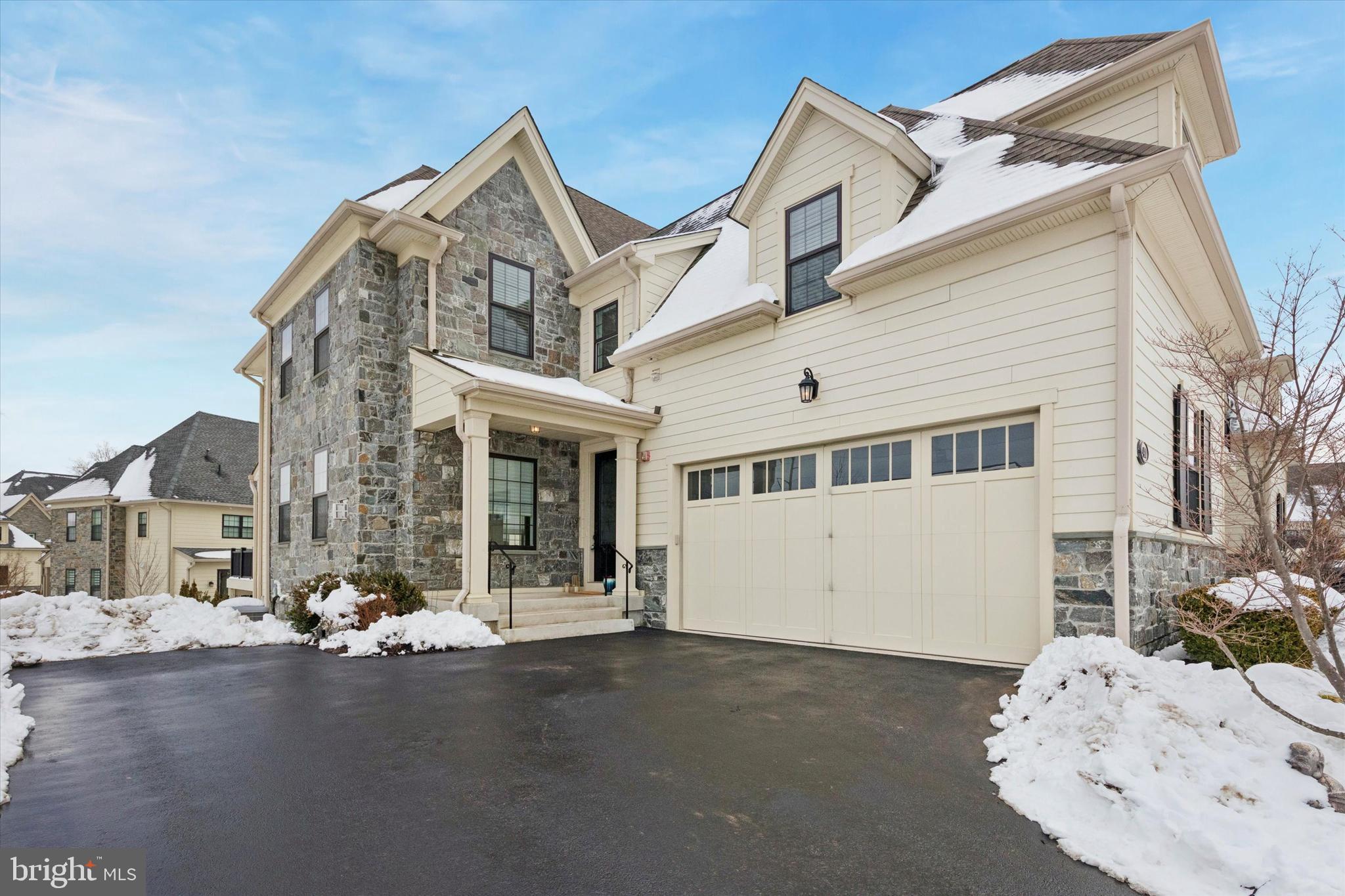 Welcome to 400 Morris Ct, this 8 year young end-unit carriage home located in the prestigious Reserve at Creekside. This charming home is situated adjacent to the  Philadelphia Cricket Club Wissahickon golf course.  The Cresheim model features over 3,603 square feet of living space on 3 levels, with plenty of natural light coming through the large windows of the open concept end-unit. This house is perfect for anyone who loves a roomy and comfortable living environment.
As you enter into the home you notice the bright open layout that makes this home so airy and inviting.  As you enter into the main living space including the large living room with beautiful gas fireplace and formal dining room right next to the expansive chef's kitchen featuring upgraded cabinetry & counter tops,  large island, upgraded appliances and even a separate wet-bar area for all of your entertaining needs. This model features a special main-floor office featuring double french doors for privacy.  Head outside to the composite deck where you have peace and quiet and can enjoy your morning coffee or evening cocktail. This floor is complete with a coat closet and beautiful powder room and access to the 2-car attached garage.
Notice the upgraded hardwood floors throughout the main floor, up the beautiful staircase and throughout most of the second floor!
Head upstairs where you will find the Main suite with hardwood floors continuing through the double doors, featuring a large sleeping area with a deluxe bathroom to wow any King & Queen. The bathroom is massive, featuring double sinks, beautiful oversized tiled rain shower and a separate water closet. The huge main closet  and double wall closet have been left to your imagination to design. The second and third large bedrooms are found on the second floor, along with a large hall bathroom and laundry room.
Head down to the daylight lower level where you find the perfect Man Cave and/or Oasis. The space can be used for lots of fun TV hangout time, playing cards or mah jong,  another office space.... or it can be turned into another bedroom if needed!  There is walk-out access to the lower patio along with lots of closets and storage available in the lower level.
Don't miss this quiet location in the rear outer side of this neighborhood.  This home has great views out all of the windows, there is no looking into others homes.  The neighborhood is convenient to the Philadelphia Cricket Club, Erdenheim Farm, Ft Washington train station, Flourtown shopping and so much more. It's truly a special part of Whitemarsh Township to live and enjoy.