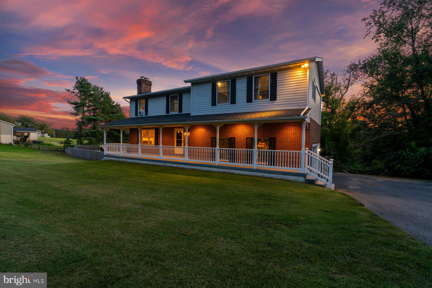 OPEN HOUSE SATURDAY 5/6 12-2PM - Welcome Home to a Lovely Retreat in the Hereford Zone! This beautifully updated 5-bedroom, 3.5-bath home is your private oasis, complete with a brand-new in-ground pool and patio (2024), New pool fence (2026)—perfect for relaxing and entertaining. Step onto the expansive covered front porch and enter through a welcoming foyer that flows into the elegant dining room with a cozy wood-burning fireplace. The open-concept kitchen and dining area features a walk-in pantry, ideal for home chefs and families alike. Enjoy the spacious family room with vaulted ceilings, skylights, and direct access to a new maintenance-free deck—seamlessly blending indoor and outdoor living. The fully fenced rear yard is a private paradise, boasting fresh landscaping, a shed, and your sparkling new saltwater pool and patio. Upstairs, you'll find five generously sized bedrooms, including a luxurious primary suite with a large walk-in closet, jetted soaking tub, an updated walk-in shower, and dual vanities. A second bedroom offers an en suite bathroom with a stunning updated walk-in shower. Three additional bedrooms share a beautiful hall bath with tub/shower. Enjoy brand-new hardwood flooring throughout the upper level and fresh paint.  The finished lower level features a spacious recreation room with new carpet. The slider door allows plenty of natural light and opens directly to the patio and pool area. Laundry room on main level with shelving and cabinets. Two car oversized garage & mudroom. All new kitchen ss appliances 2024, New flooring upper level, new hardwood flooring in lower level, New HVAC 2023, New Deck 2024, New mini split in primary suite 2024.  Excellent location and schools!