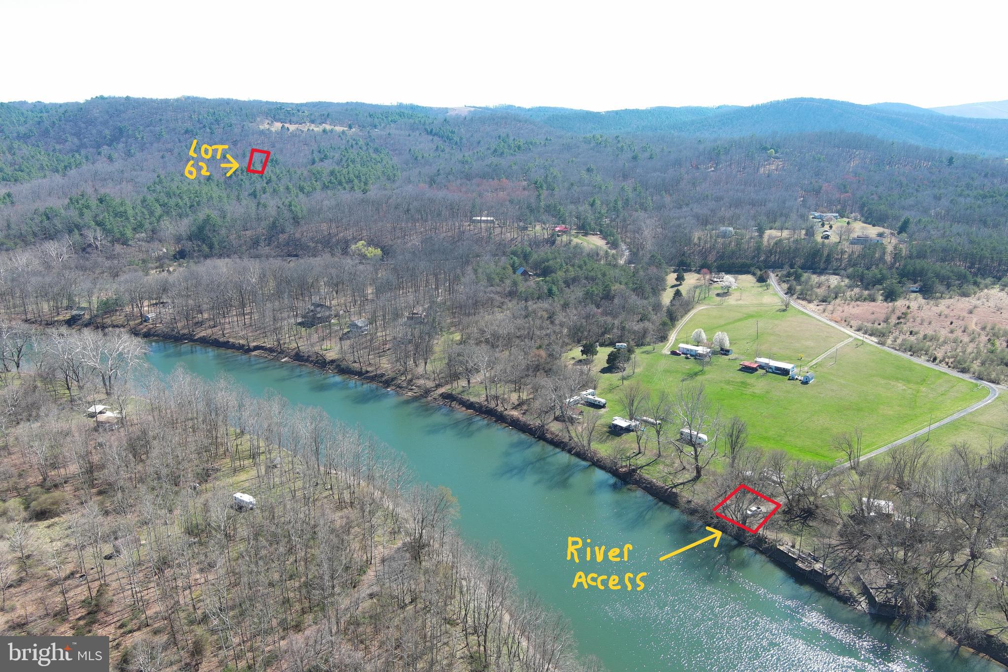 GOOD TIMES ON THE CHEAP.....2 GORGEOUS WOODED ACRES BURIED DEEP IN THE MOUNTAINS OF ALMOST HEAVEN WITH PRIVATE DEEDED ACCESS TO THE SOUTH BRANCH OF THE POTOMAC RIVER! GREAT FOR CAMPING OR BUILDING, CLEARED CAMP SITE IN PLACE WITH ELECTRIC HOOK UP ON SITE, METER SOCKET NEEDS INSPECTED AND CAN BE RE SET.....IT WOULD COST $2500 THESE DAYS TO SET UP A METER & PANEL BOX....SO YOU'RE ALREADY WAY AHEAD OF THE GAME. VERY PRETTY WOODS, HUGE WHITE PINES, MATURE OAKS, SMALL RIDGE AND BIG HOLLOW. OLD CAMPER CONVEYS WHETHER YOU WANT IT OR NOT, NO TITLE. IF YOU'RE LOOKING FOR A CHEAP PIECE OF LAND WHERE YOU CAN HAVE A GOOD TIME, THERE'S NOT A BETTER DEAL TO BE HAD.