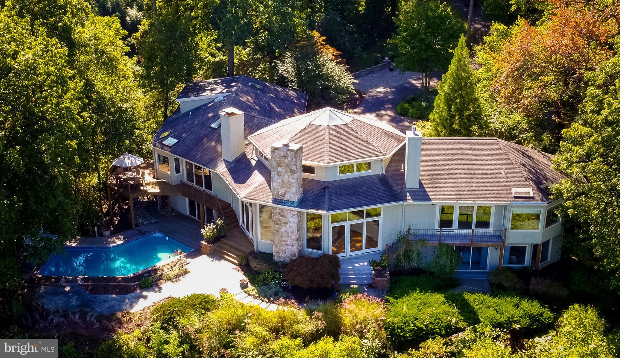 Stunning Custom Estate offers a unique blend of old world charm & contemporary elegance.  Home features panoramic, breathtaking views of the Severn River.  Completely renovated Chef's Gourmet Kitchen with appliances from Wolf, Meile & Sub-Zero. 1st Floor Master and private in-law suite.  Waterside Pool, Patio, Deck, Pier with up to 4 slips, 340 ft. water frontage MLW 8'-10'.  Private Location.
