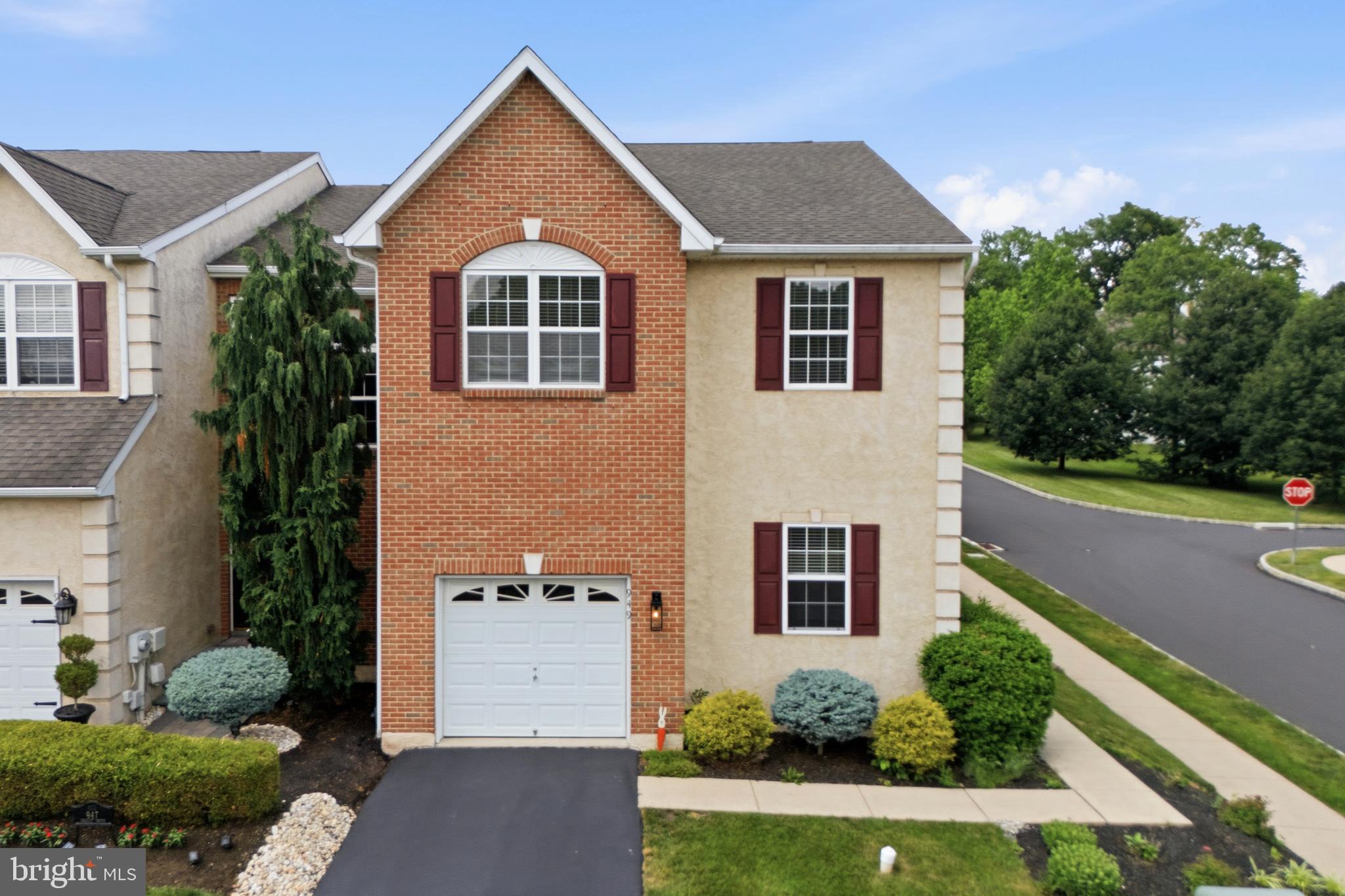 Welcome to 949 Cholet Drive, a beautifully updated end-unit townhome in the highly desirable Monroe Court community, located within the award-winning Perkiomen Valley School District.

Freshly painted throughout in a timeless designer white palette, this move-in ready home offers over 2,000 square feet of thoughtfully designed living space, combining modern updates with effortless everyday comfort. From the moment you enter, you'll appreciate the dramatic two-story foyer, abundant natural light, and spacious open-concept layout.

The updated kitchen serves as the heart of the home, featuring stylish finishes, upgraded cabinetry, and ample workspace for cooking, entertaining, and gathering with family and friends. Rich flooring flows throughout the main living areas, creating a warm and cohesive feel.

Upstairs, the spacious primary suite offers a private retreat complete with a beautifully renovated bath and generous closet space. Two additional bedrooms, an updated hall bath, and convenient second-floor laundry complete the upper level.

The finished lower level provides valuable bonus space perfect for a media room, home office, fitness area, or playroom, while the attached garage and additional storage add everyday practicality.

As an end-unit, the home enjoys added privacy, extra windows, and abundant natural light. Outdoor living is equally inviting with a spacious deck ideal for morning coffee, outdoor dining, or relaxing evenings.

Located just minutes from charming Skippack Village, Collegeville shopping and dining, Evansburg State Park, Palmer Park, and the Perkiomen Trail, this home offers the perfect blend of convenience, recreation, and community.

Beautifully updated, meticulously maintained, and truly move-in ready—949 Cholet Drive is a home you won't want to miss.