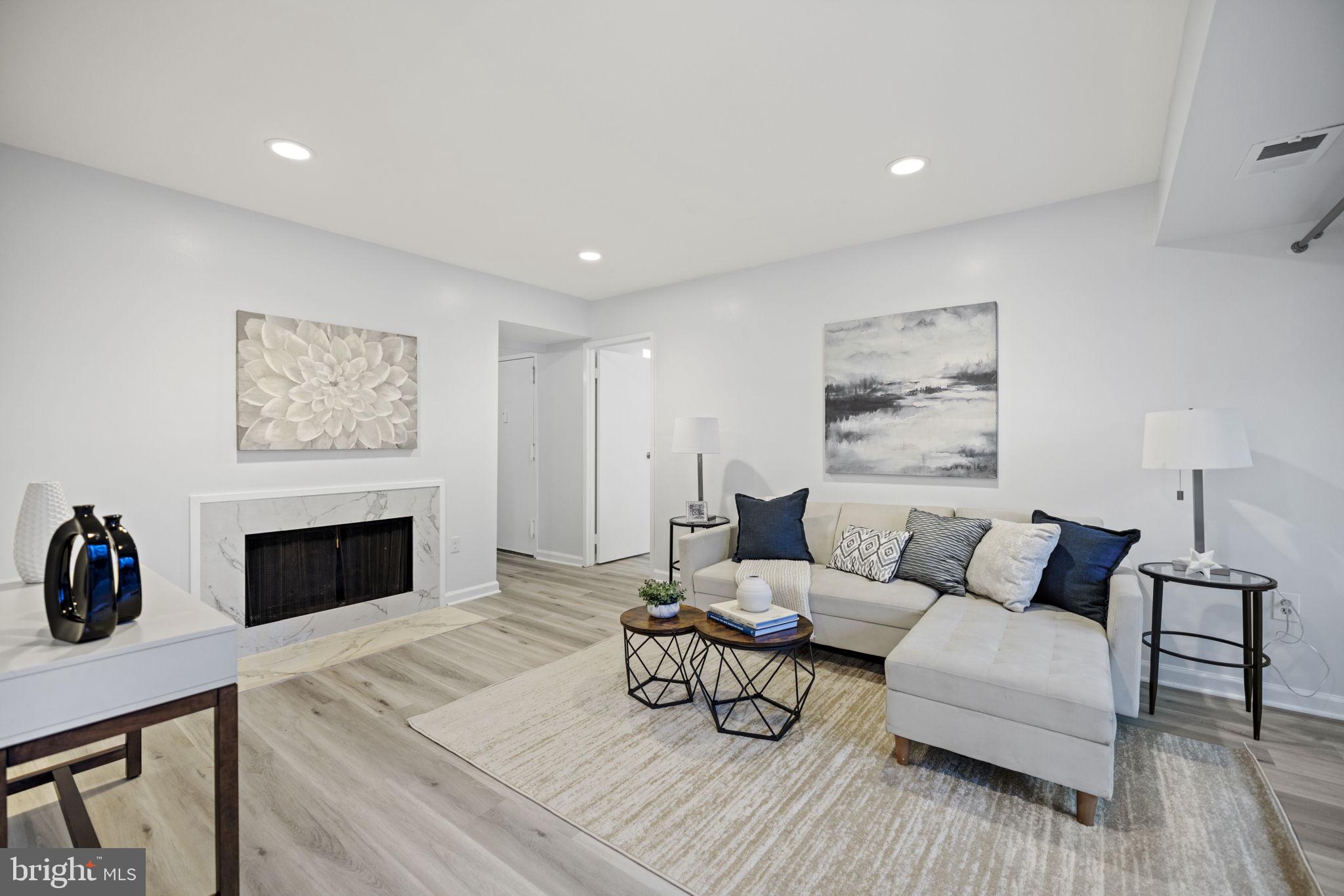 Excellent location in the heart of Reston & Move-in ready 3 bedroom, 2 bath condo in Springwood!! Upgrades throughout include new flooring (2023), freshly painted throughout (2023), new windows (2019) , new hot water heater, HVAC (roughly 6 years old) and both bathrooms were redone (2021). Great floor plan with a separate dining room, fireplace, washer/dryer in unit and additional storage. Springwood has a lot to offer! The amenities include 1 assigned parking space (#18) with ample additional parking, tennis courts, basketball courts and MORE. Additionally, residents will be able to enjoy the benefits of the Reston Association, such as multiple pools, walking/jogging trails and access to lakes.  COMMUTERS DREAM- with access to metro with easy commute to Tysons or DC!! MUST SEE!!