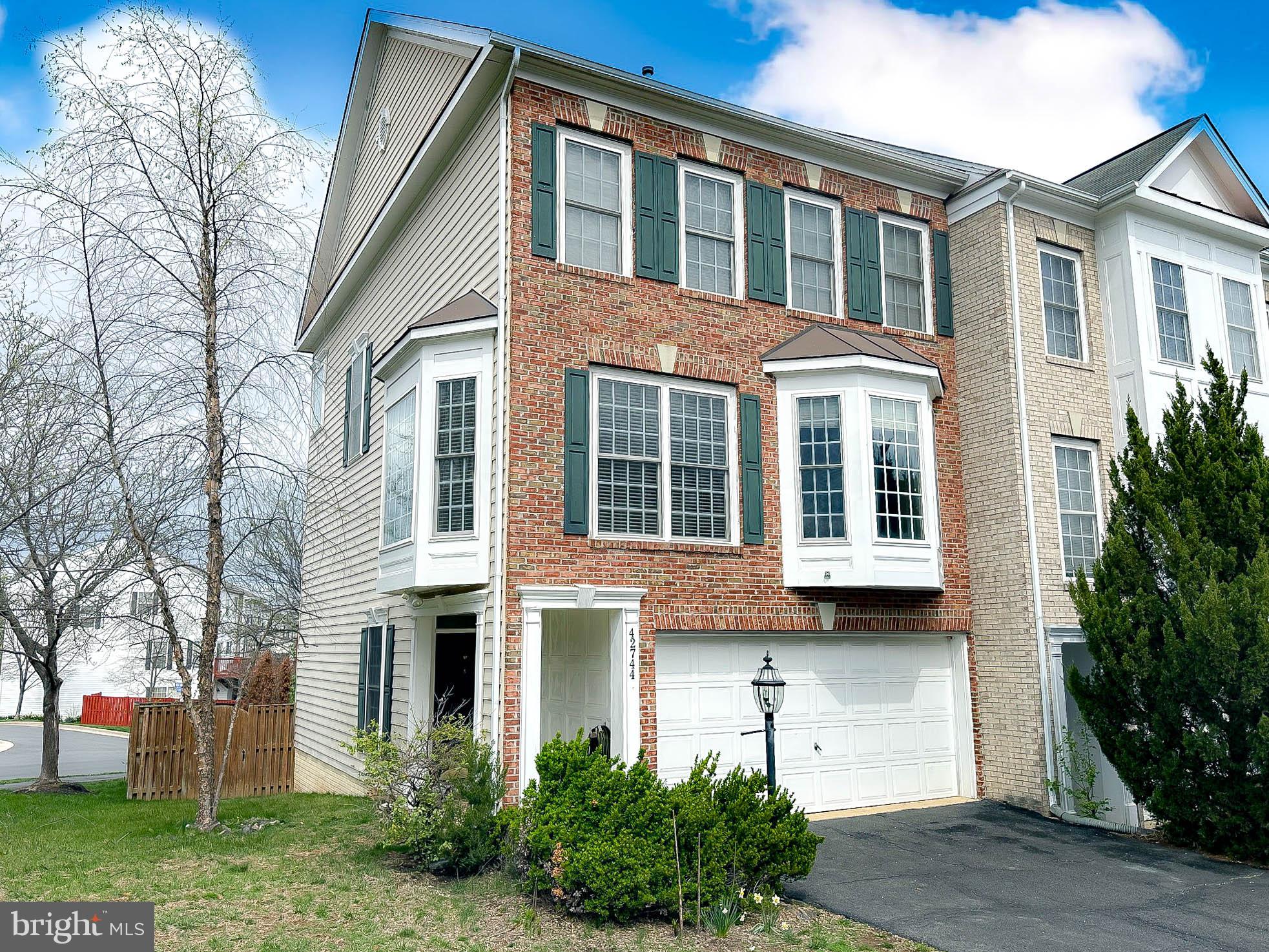 Stunning brick front END UNIT town home featuring 3 bedrooms, 3.5 baths, and 3 fully finished levels with more than 2200 square feet!  This home sits on a premium lot on a no thru street with a large fenced-in back yard!  Step inside and enjoy brand new carpeting, premium bamboo hardwoods, a massive living room w/ soaring ceilings and Palladian windows that overlook a large refinished deck.  There's a large dining area, and gourmet kitchen w/ snack bar, SS appliances, a custom backsplash, and 2 bay windows to let the sun shine in!
The upper level features a vaulted primary suite w/ walk in closet and luxury bath with dual sinks, a soaking tub, and shower stall.  2 additional bedrooms, a full bath, plus laundry is on the level!  The walk out lower level features another full bath, tile flooring, a wet bar, a built in murphy bed (that conveys) and sliders that walk out to a brick patio and fenced yard!  Spring Lakes features an outdoor pool, tennis and tot lots, and is conveniently located just off Rt 7 and the Battlefield parkway, near Wegmans, shops, restaurants, movie theaters, outlet shopping and Old Town Leesburg!