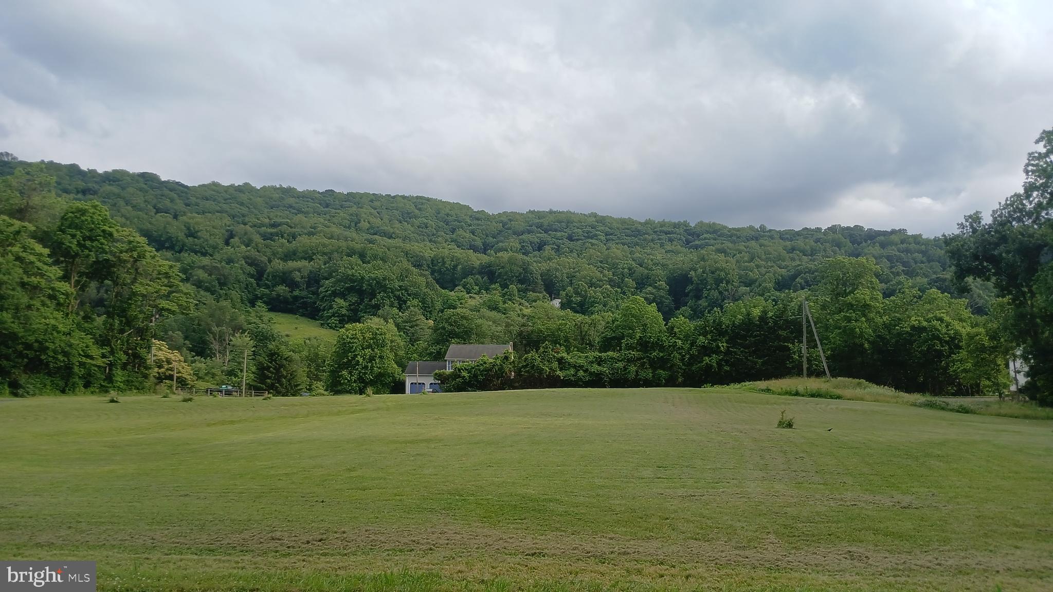 Bring your house plans owner will buid to suit on this hard to find a lot with beautiful and tranquil mountain views located at the foothills of the Shenandoah Mountains on a cleared lot ready to build on.  The house location and drain field are located as shown on the plat in the documents section.  VDH approved well in place, and the septic system is designed for a 3-bedroom perk. Lot is located 1/4 mile to the Appalachian trail to hike up Manassas  Mountain to Goose Creek, 3  miles to major commuter lot parking and local Apple House Restaurant  Less than 4 miles to I66 all hard top roads passing rolling hills, large mature trees, cattle farms and horse boarding farm, minutes away from wineries and local park to enjoy canoeing, tubing swimming and fishing and a picnic right on the  Shenandoah River. The property has a long, winding creek that runs through the property, making this lot ideal for nature lovers.  Owner Agent can build to suit or sell the land only.  There is a 20'x10' sea container that conveys, perfect for storing lawn maintenance equipment, tools and materials

This  Lot has construction entrance completed, well installed and  approved. Septic system located, house location set only need house plans to start yiur dream home