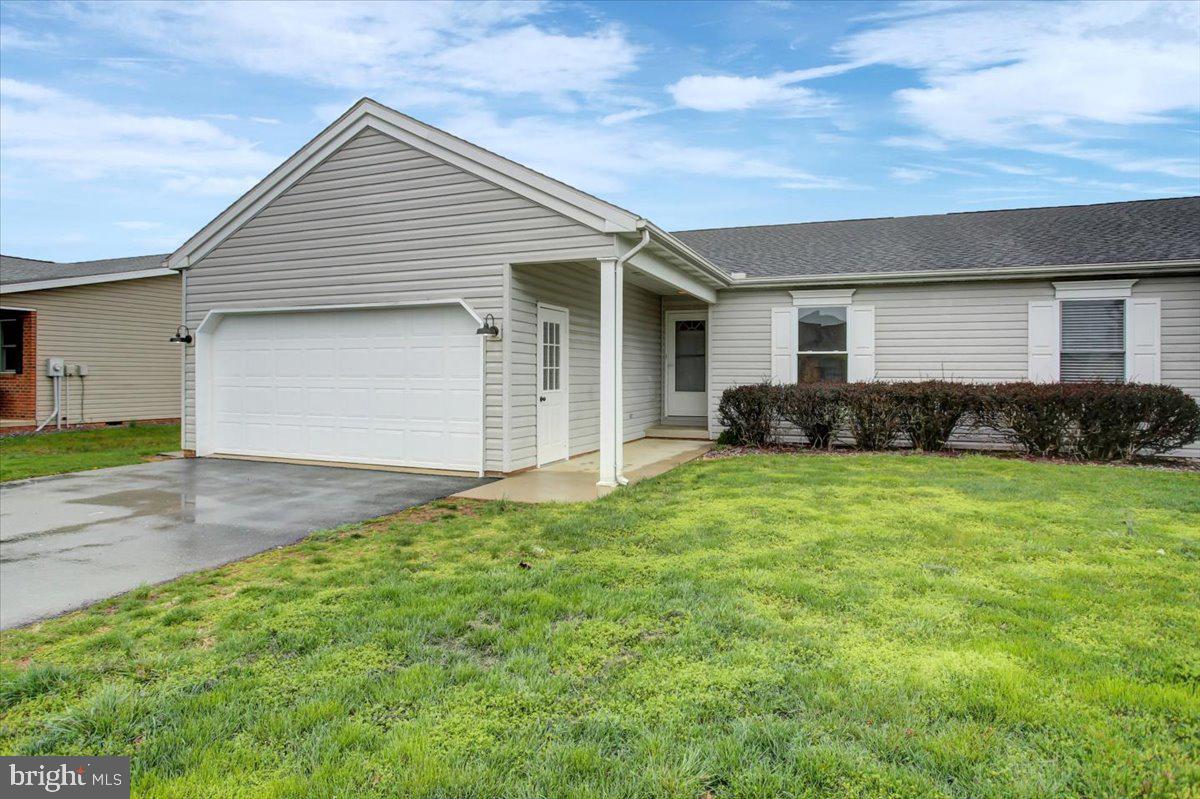 Just starting out or looking to downsize?....This spacious single level living duplex close to many downtown amenities is the place to call home!  Enjoy all of the conveniences of being close to downtown, including restaurants, Grocery stores, shopping and more! This unit is move in ready with a newer central AC unit, new flooring, paint and fixtures throughout.  The spacious garage offers ample storage space.  Enjoy the outdoors too on the covered patio.  Not many properties like this come along too often....schedule your showing today before its too late!