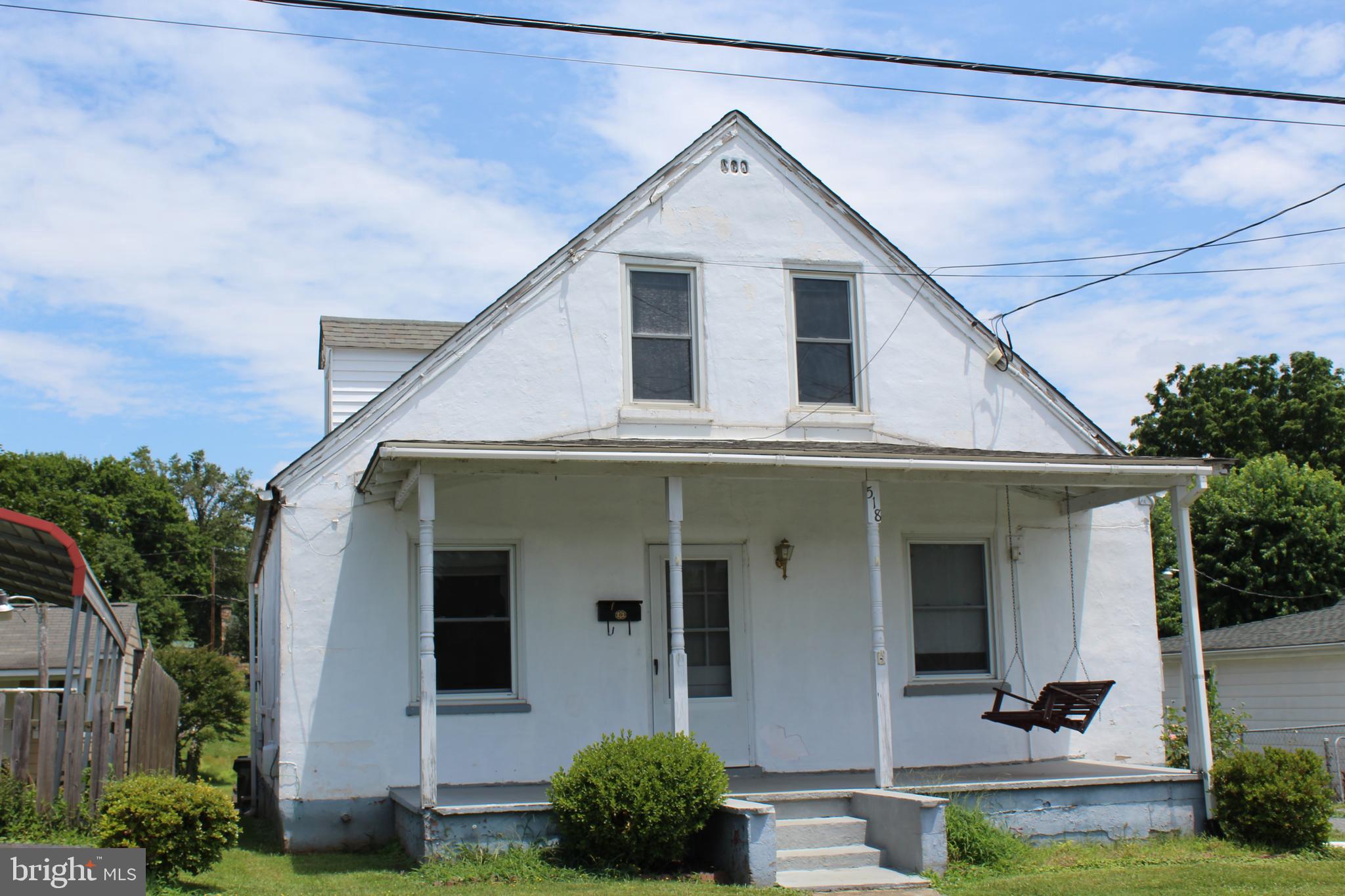 ADORABLE BUNGALOW FEATURES 3 BR'S, 2 BATHS WITH 2 BEDROOMS ON THE MAIN FLOOR AND A BATH ON EACH FLOOR.    NICE SIZED KITCHEN THAT LEADS TO A VERY LARGE DECK ACROSS THE BACK.  LEVEL BACK YARD WITH STORAGE SHED.  IN TOWN AND CLOSE TO EVERYTHING.